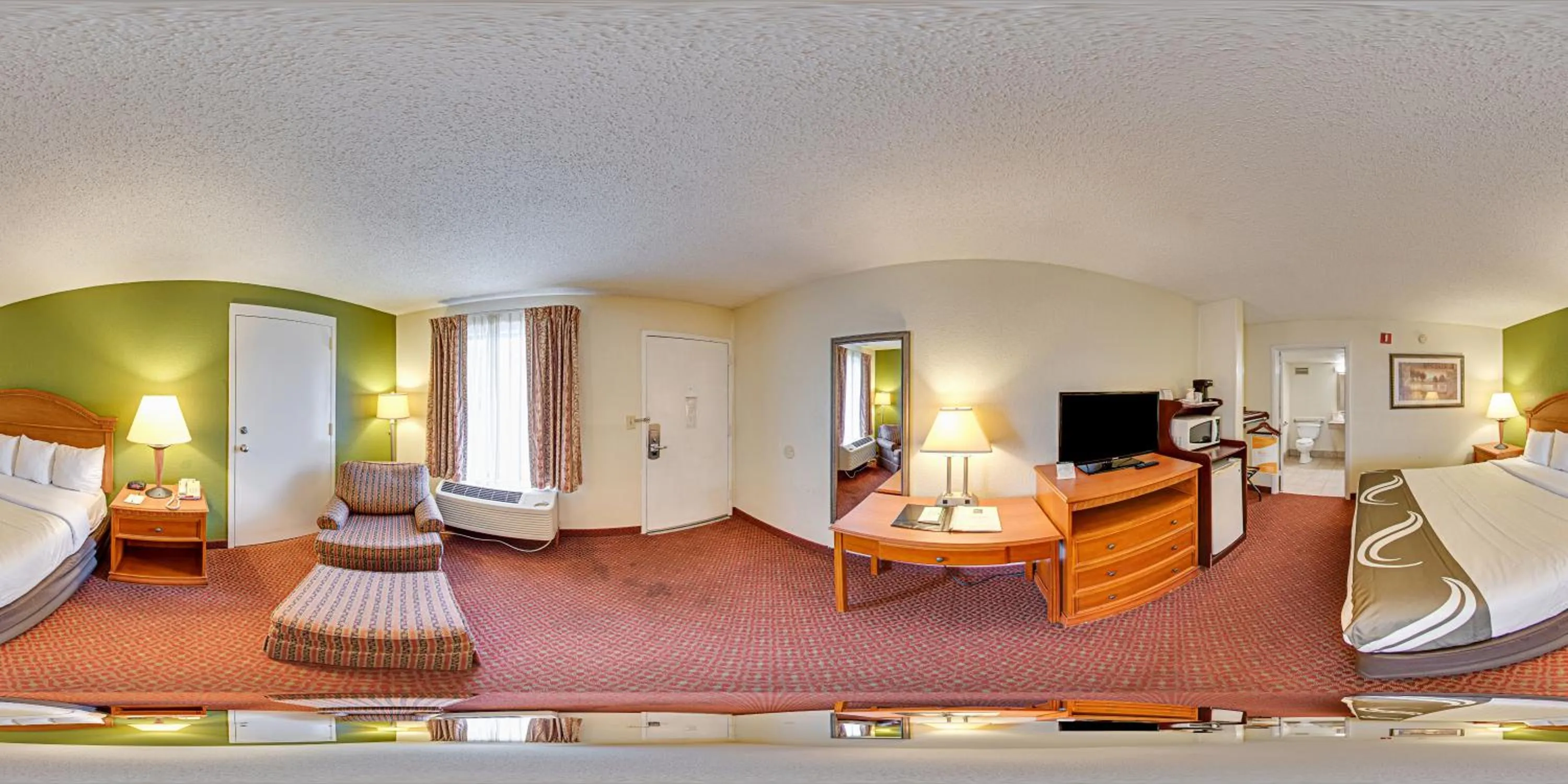 Bed in Quality Inn North