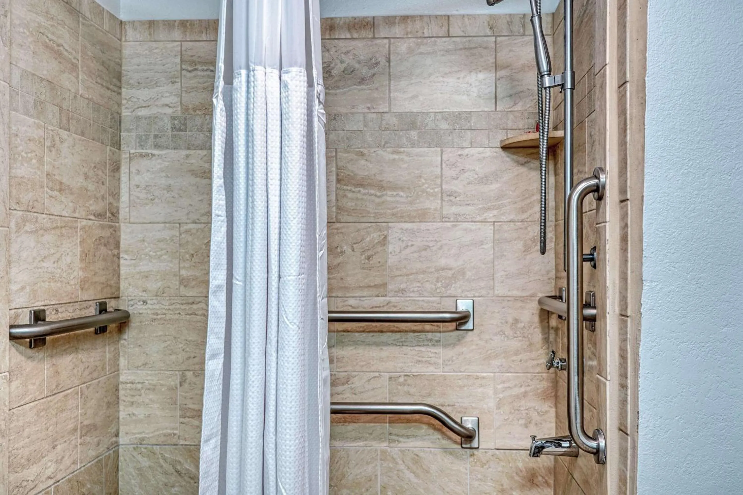 Bedroom in Econo Lodge Raleigh near Walnut Creek Amphitheatre