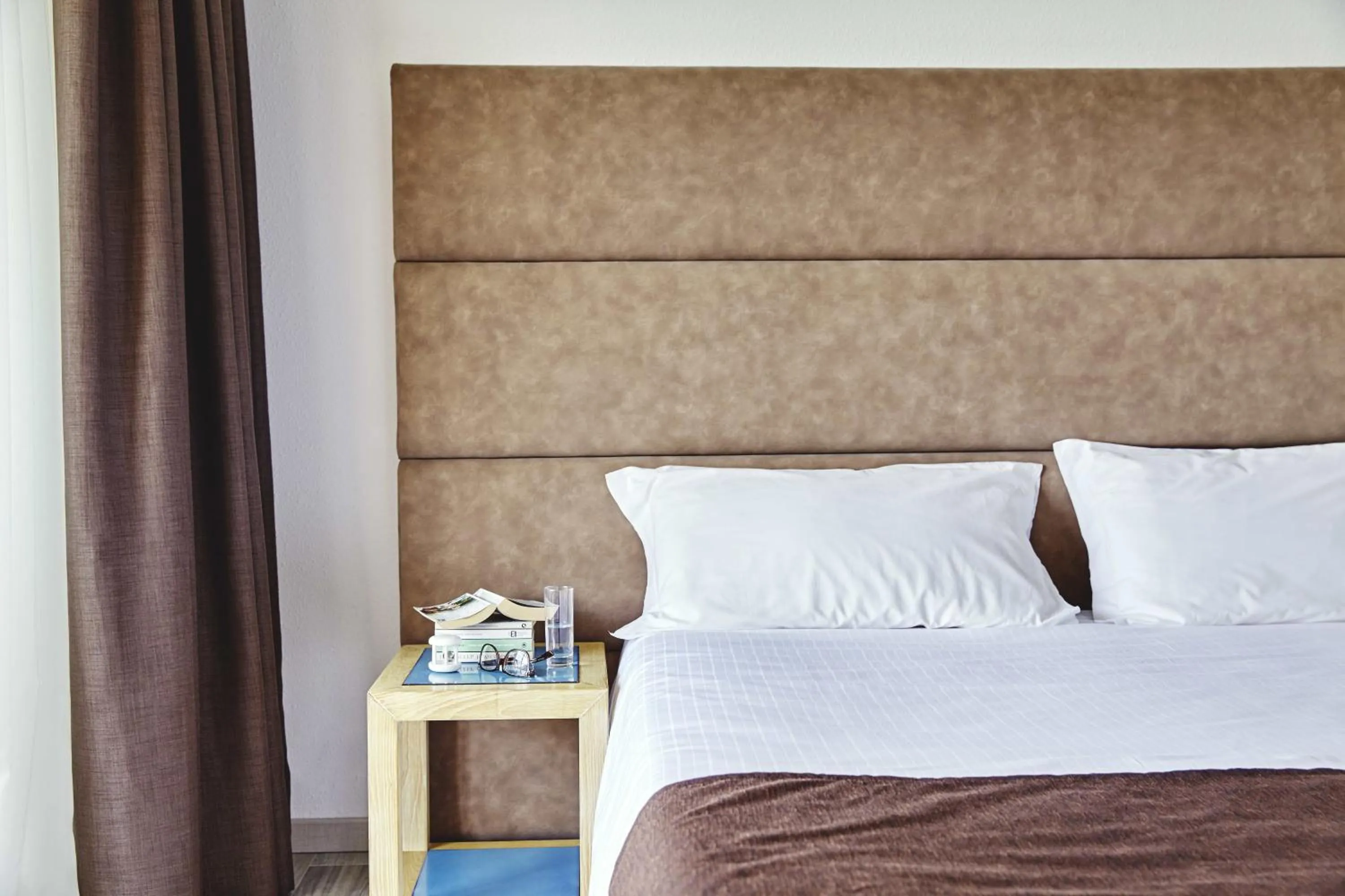 Bed in Baia di Conte Resort