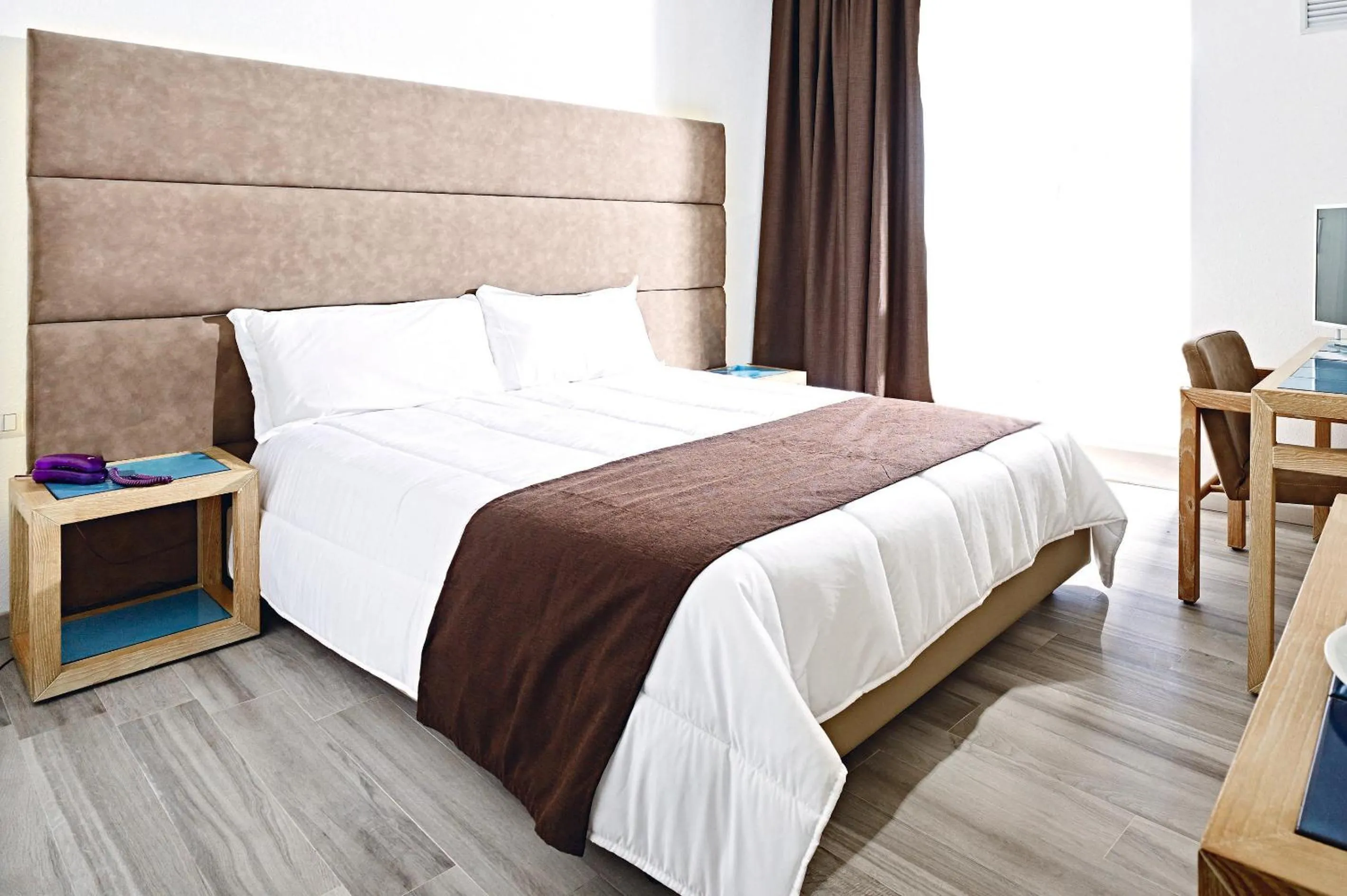 Bed in Baia di Conte Resort