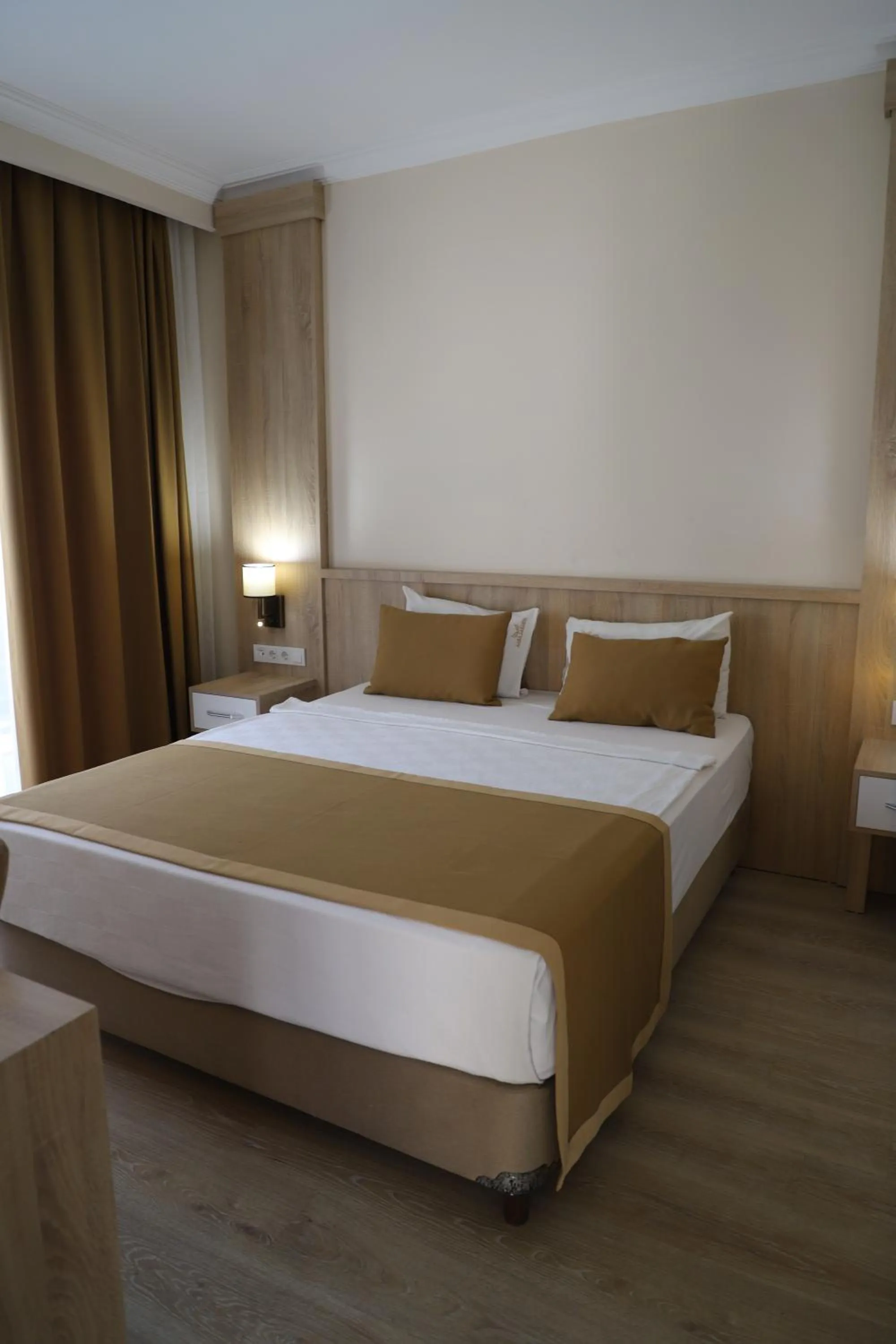 Bed in Lara Garden Hotel