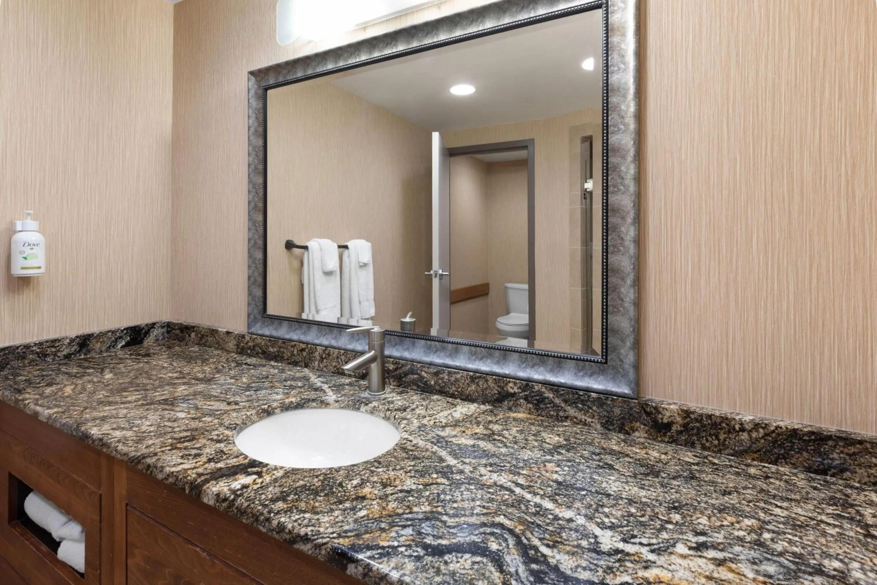 Bathroom in Baymont by Wyndham Jamestown Conference Center & Water Park