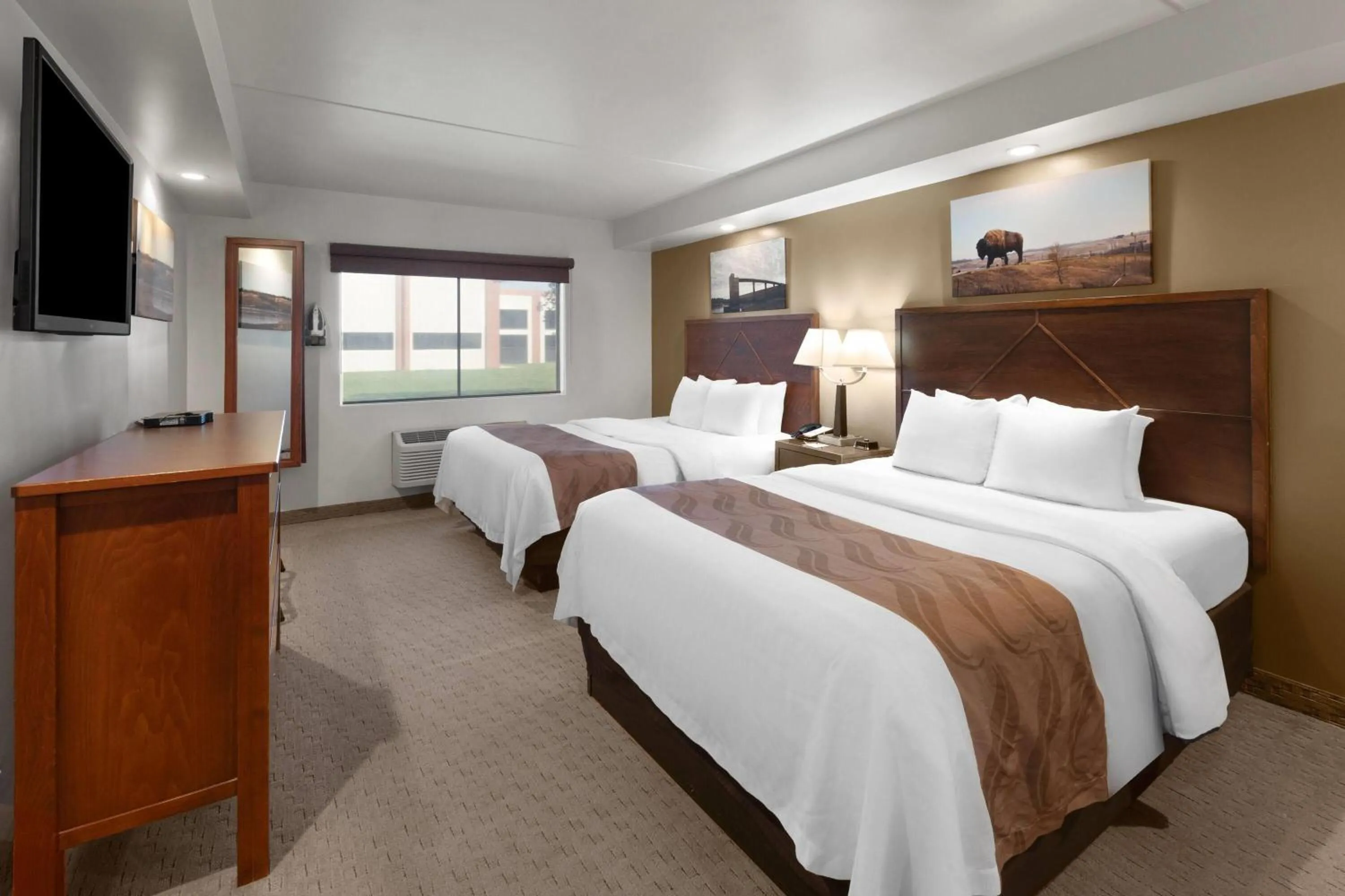 Photo of the whole room, Bed in Baymont by Wyndham Jamestown Conference Center & Water Park