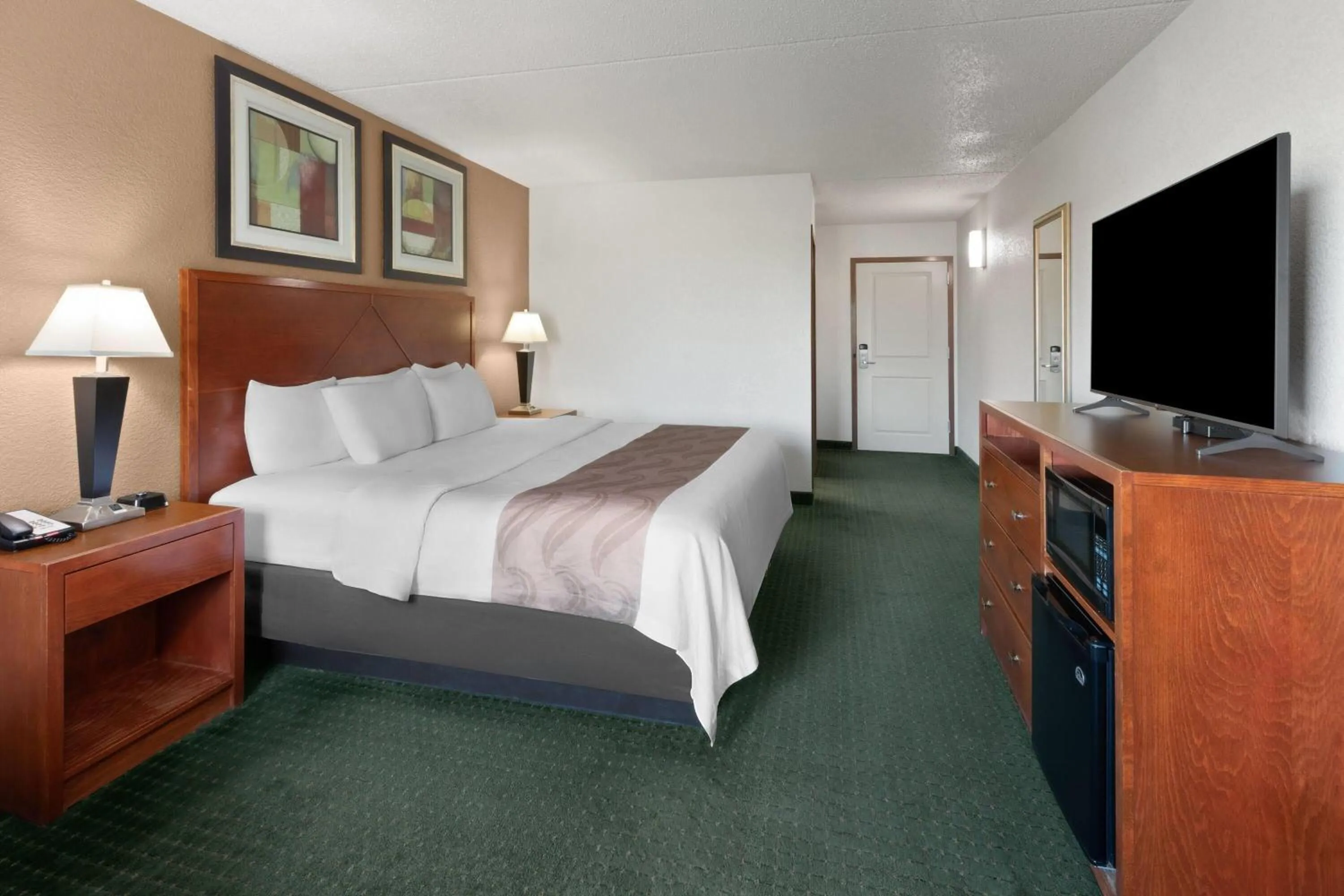 Photo of the whole room, Bed in Baymont by Wyndham Jamestown Conference Center & Water Park