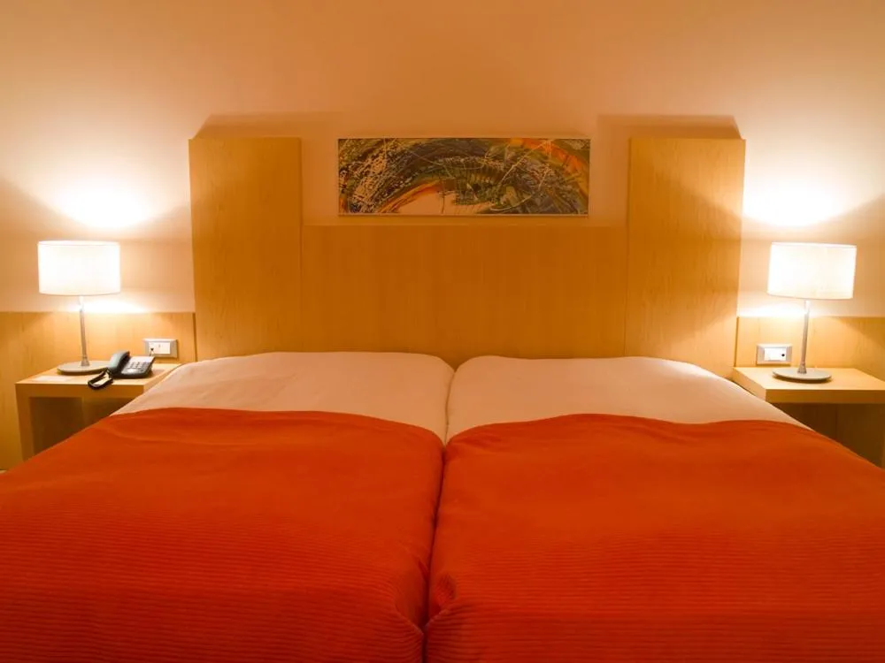 Bed in Hotel Praia