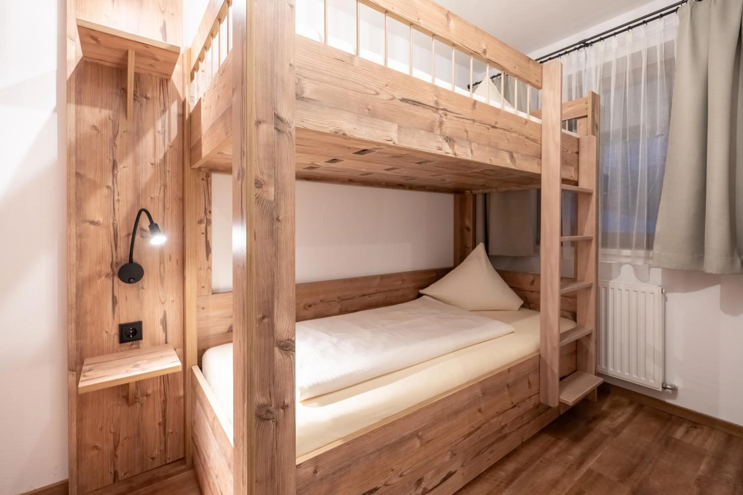 Bed in Hotel Krone Tirol