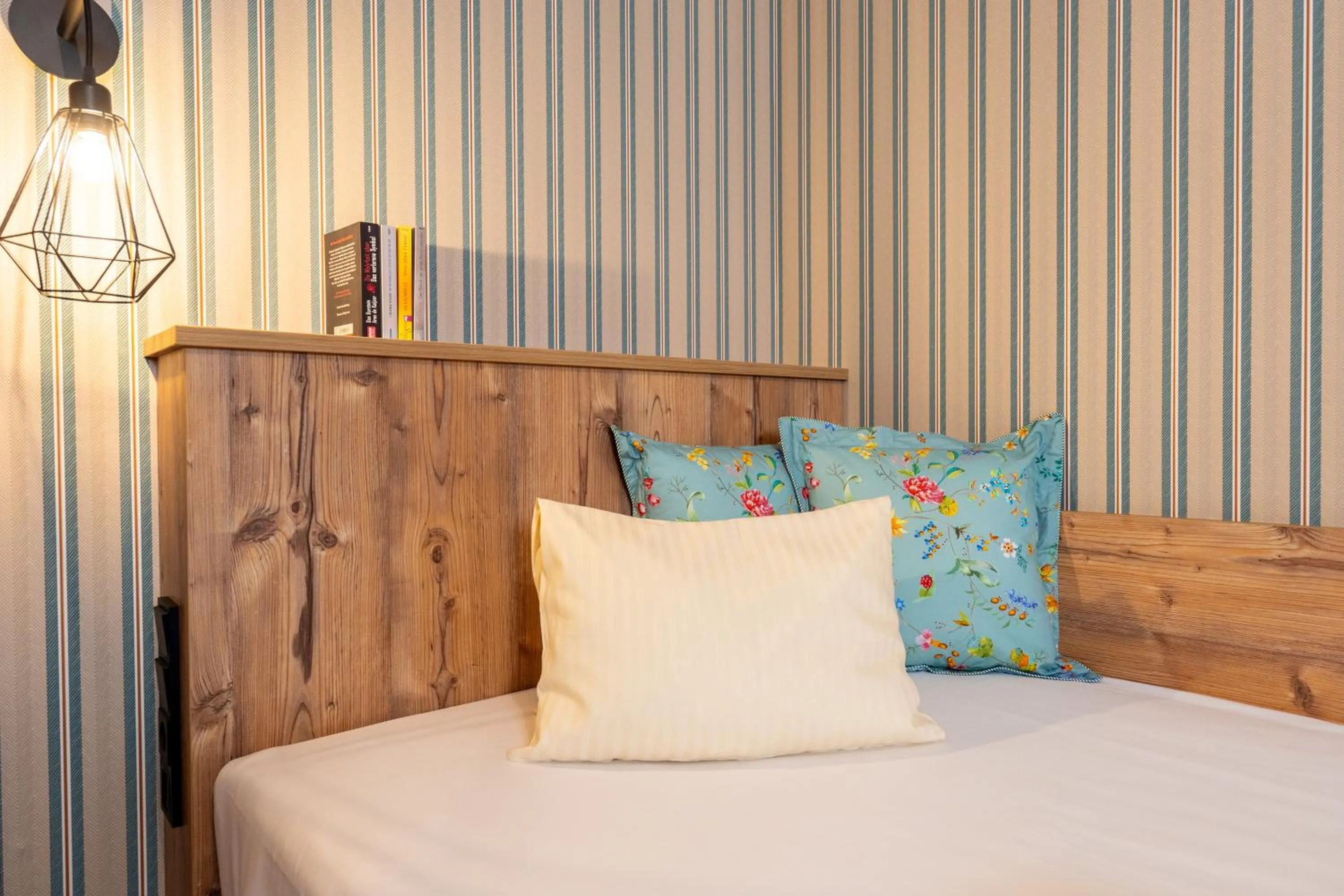 Bed in Hotel Krone Tirol