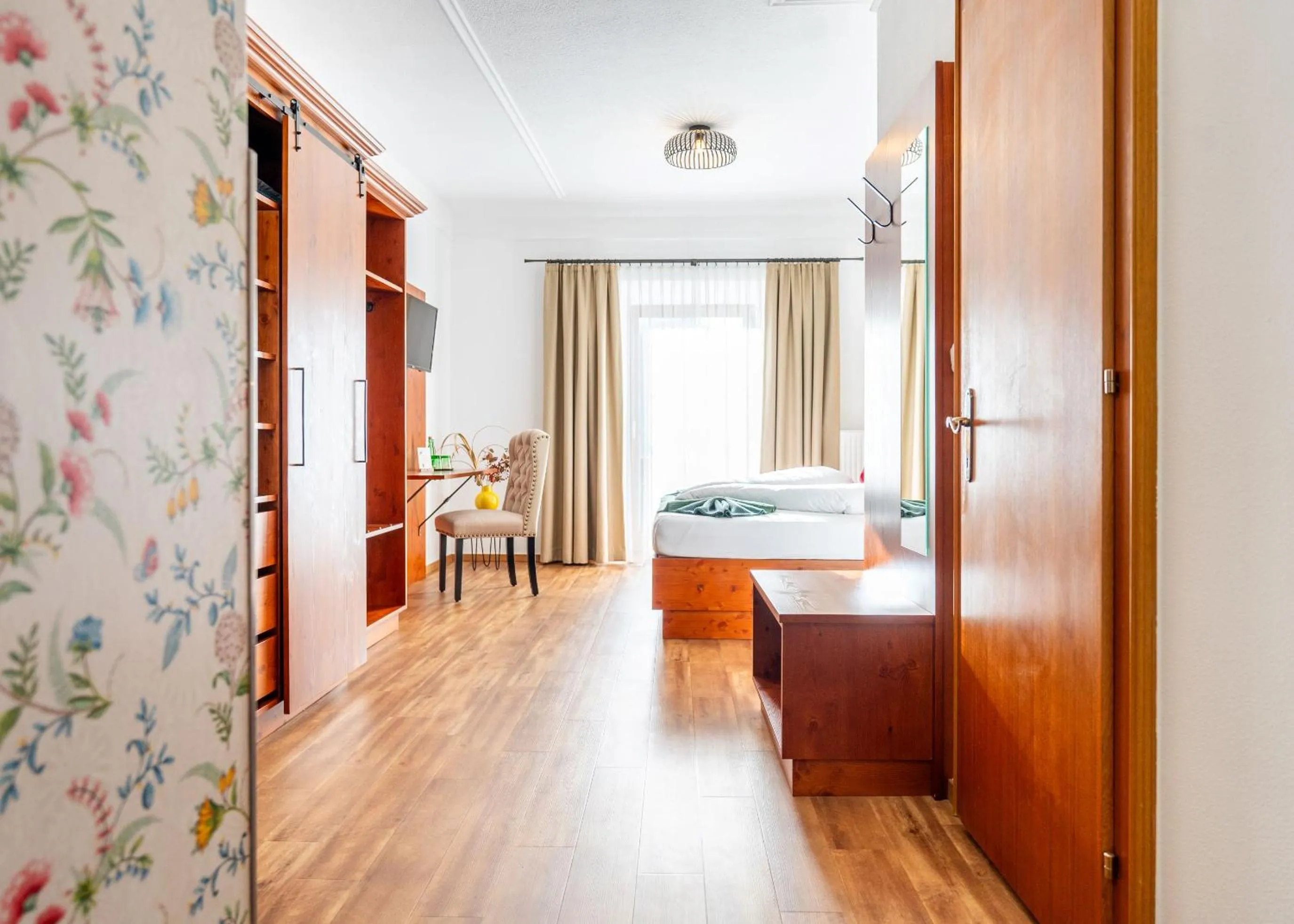 Photo of the whole room, Bed in Hotel Krone Tirol