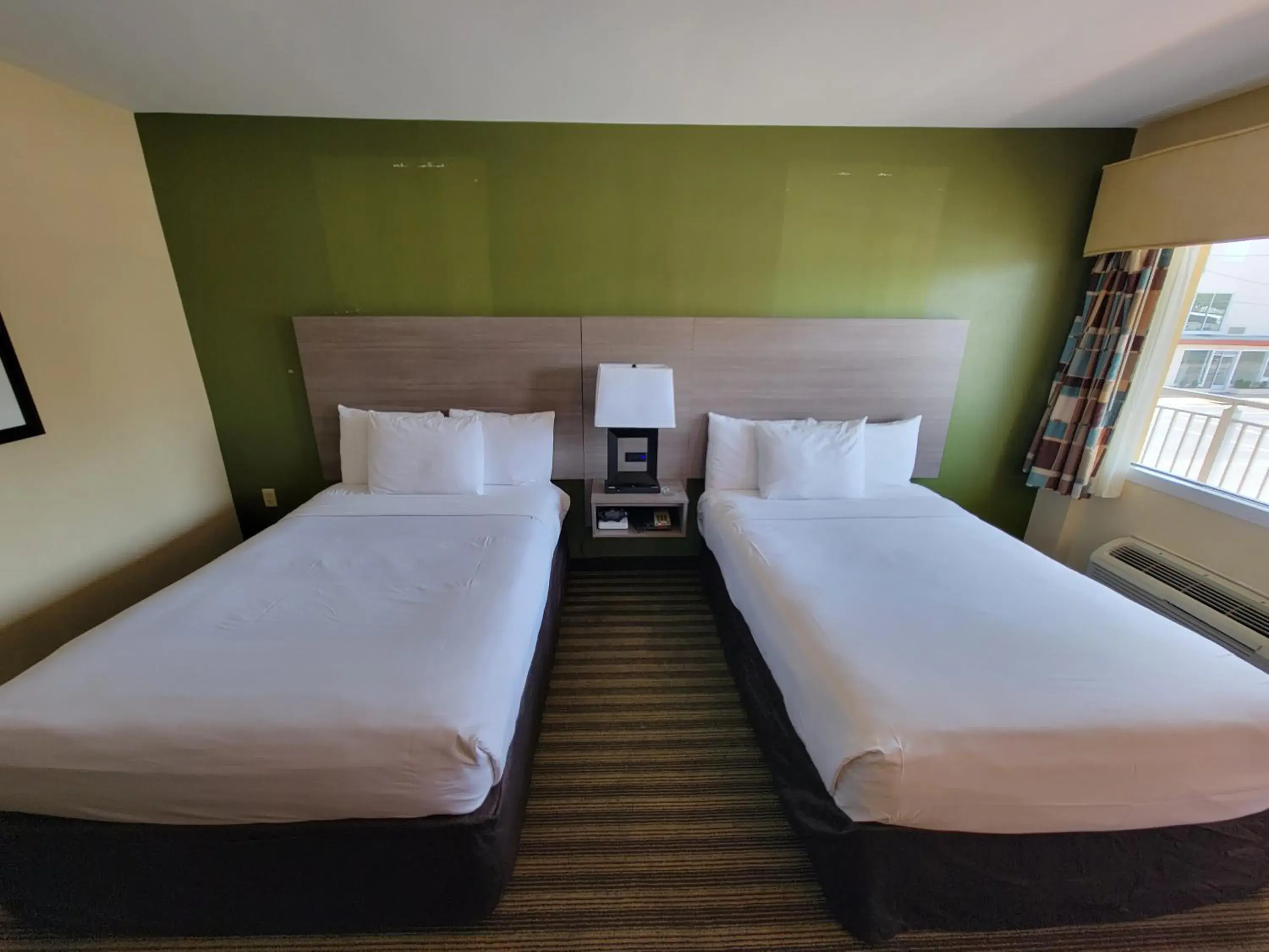 Bed in Quality Inn Flamingo Bed in Quality Inn Flamingo