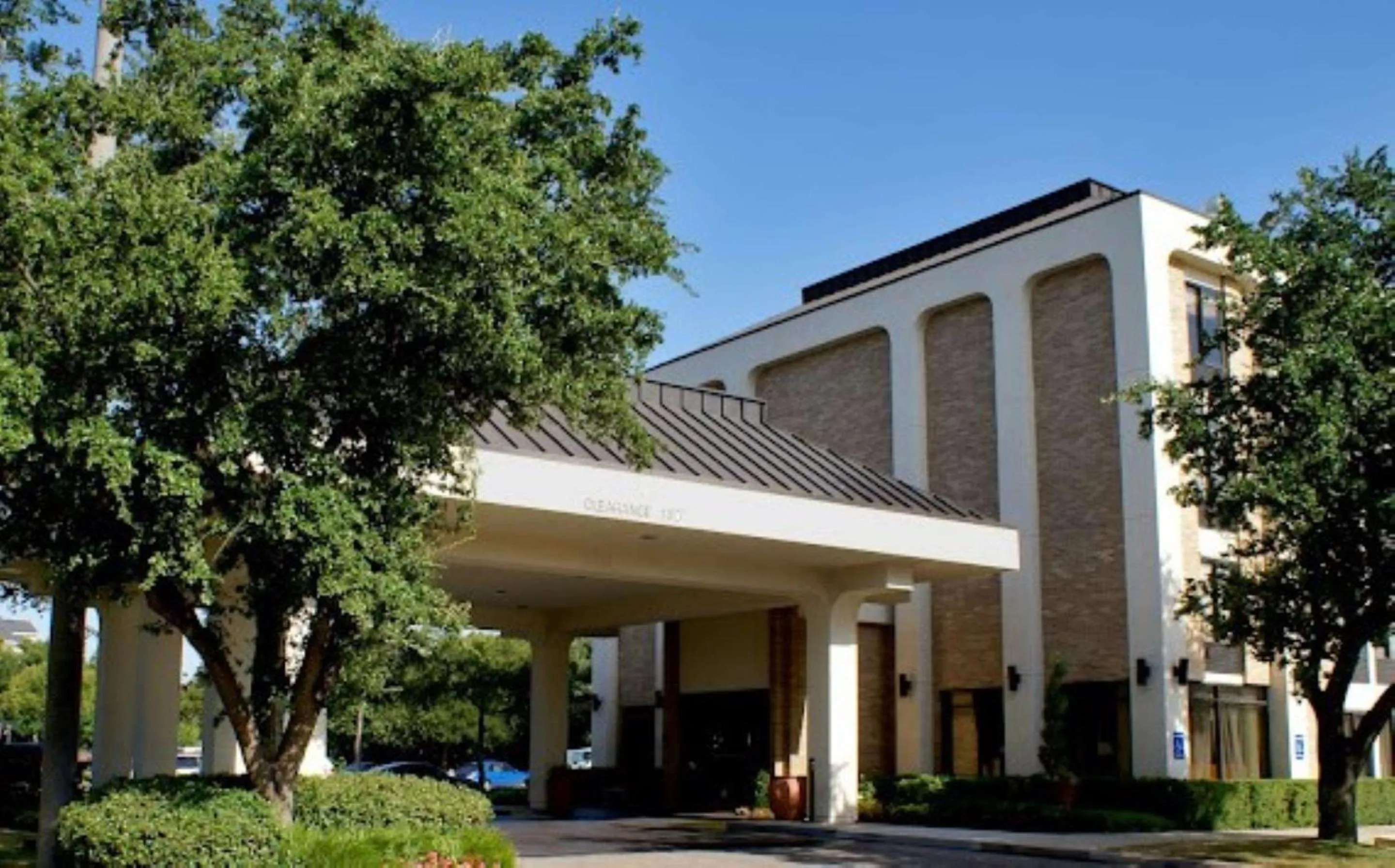 Property building in The Addison Hotel SureStay Collection by Best Western