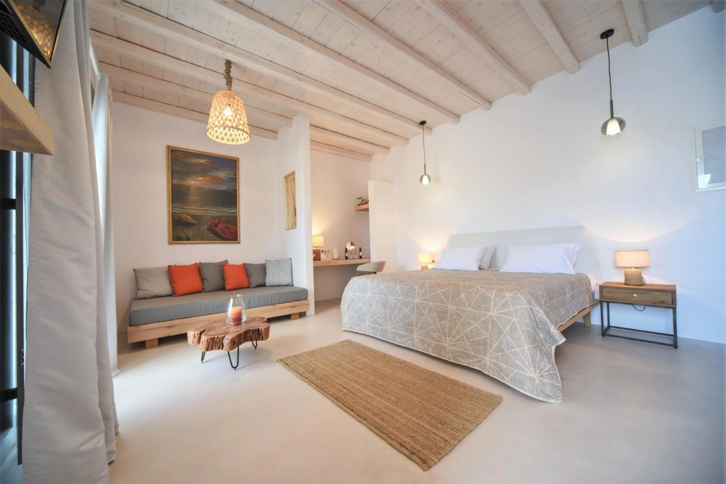 Bed in Myconian Crown Suites