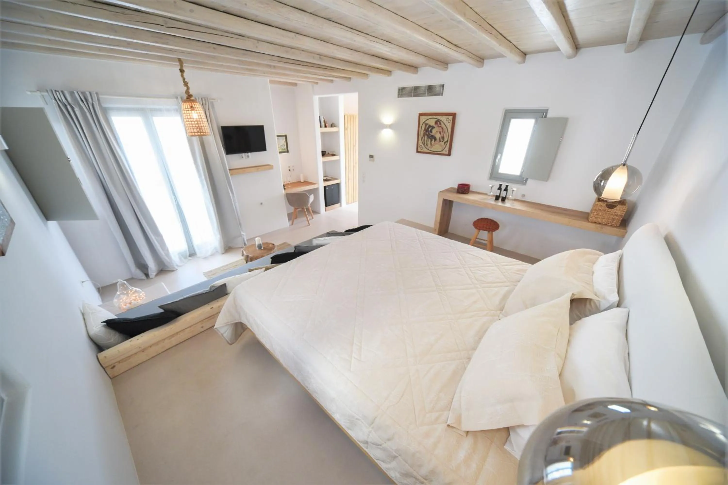 Deluxe suite with Jetted Tub and Pool View in Myconian Crown Suites