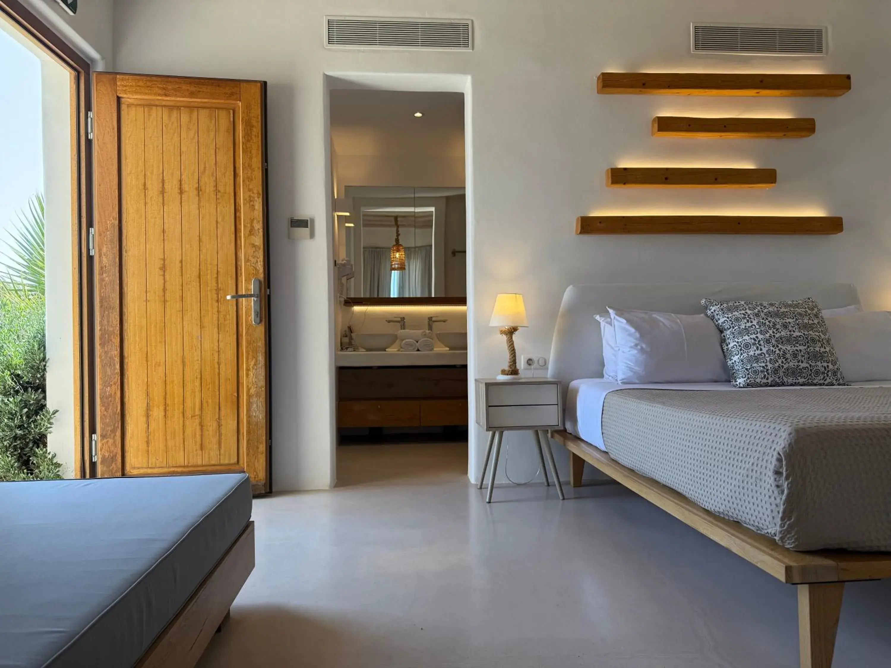 Bed in Myconian Crown Suites Bed in Myconian Crown Suites