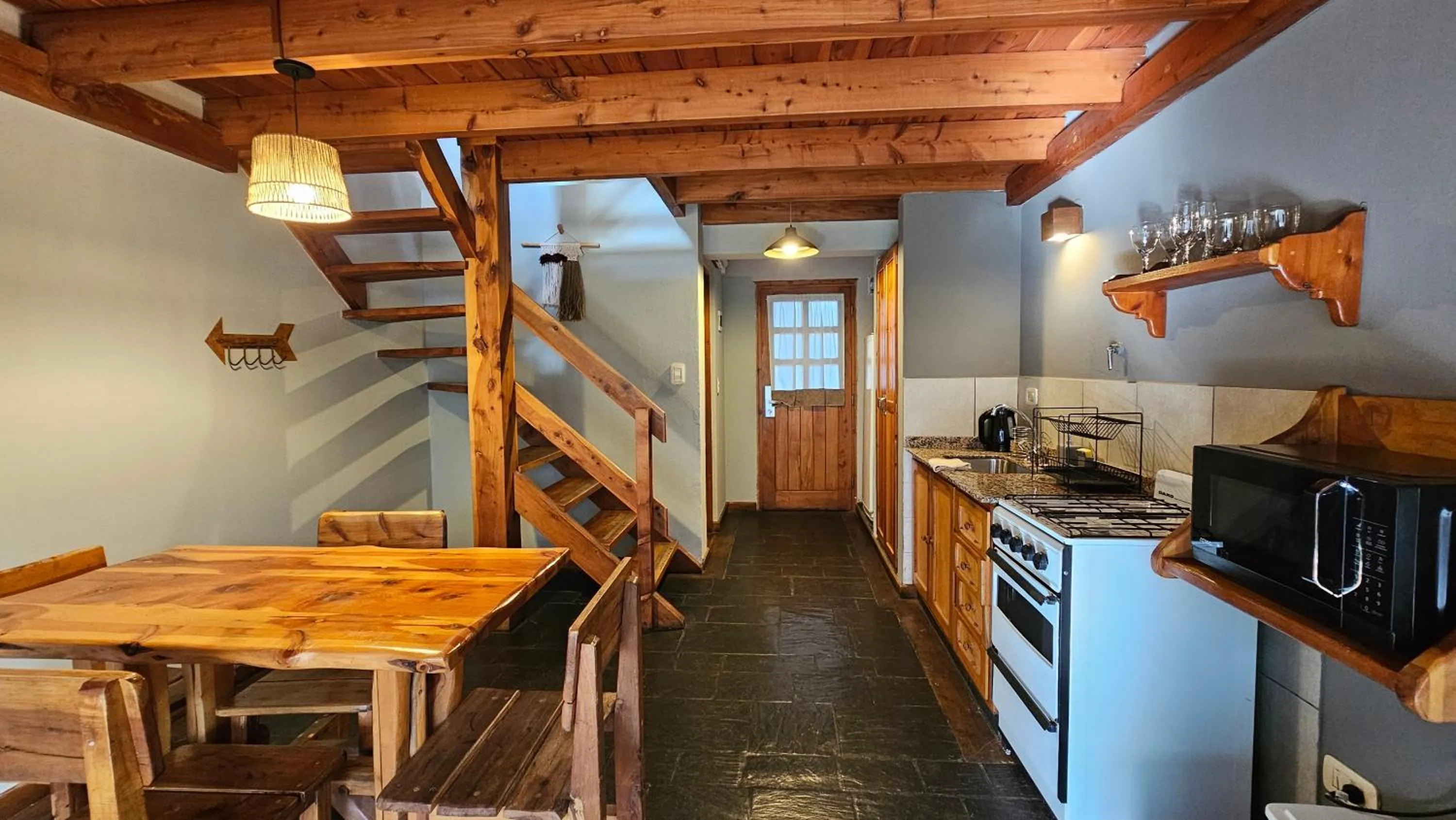 Living room in Pioneros Suites by Grupo Tierra Gaucha