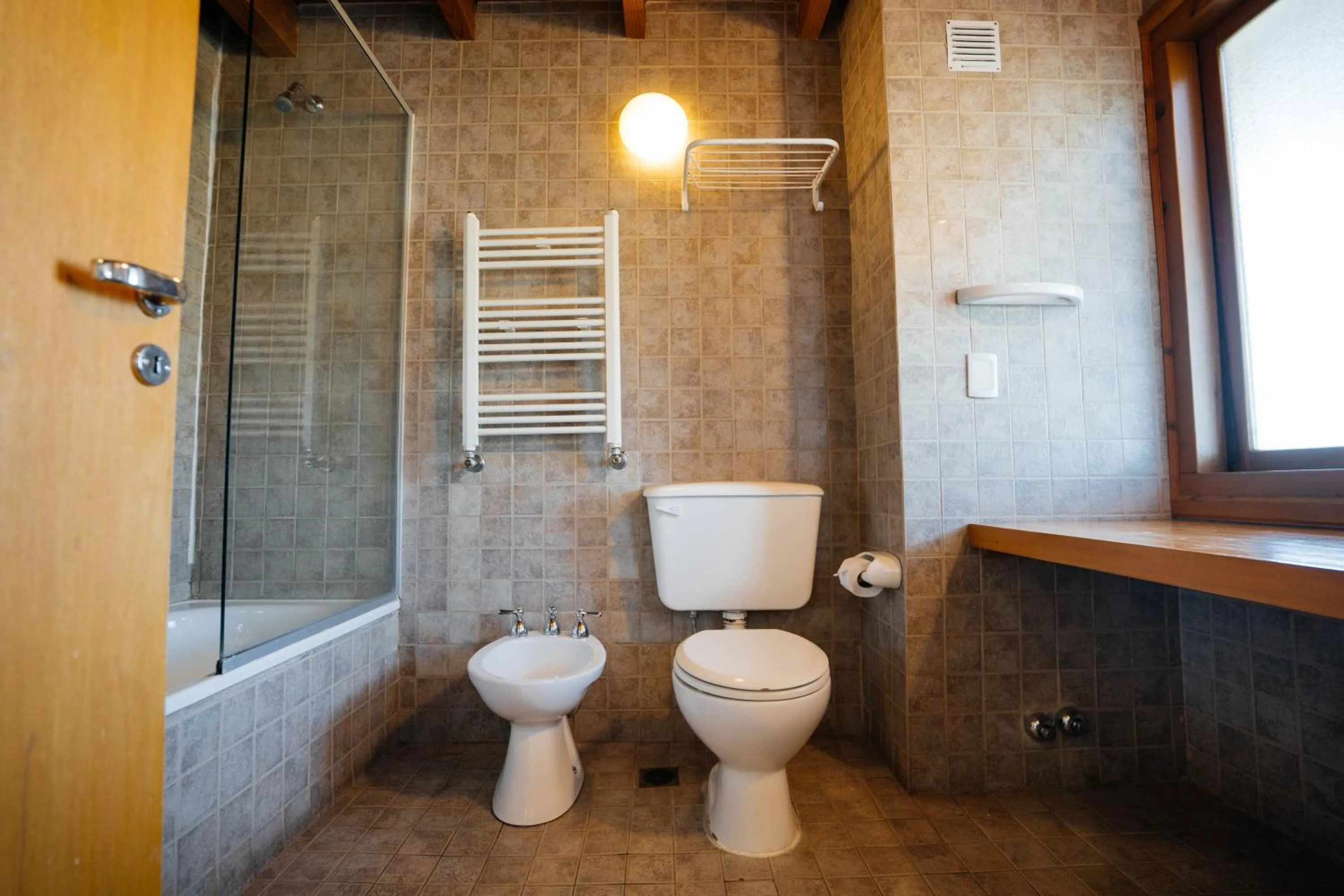 Bathroom in Pioneros Suites by Grupo Tierra Gaucha