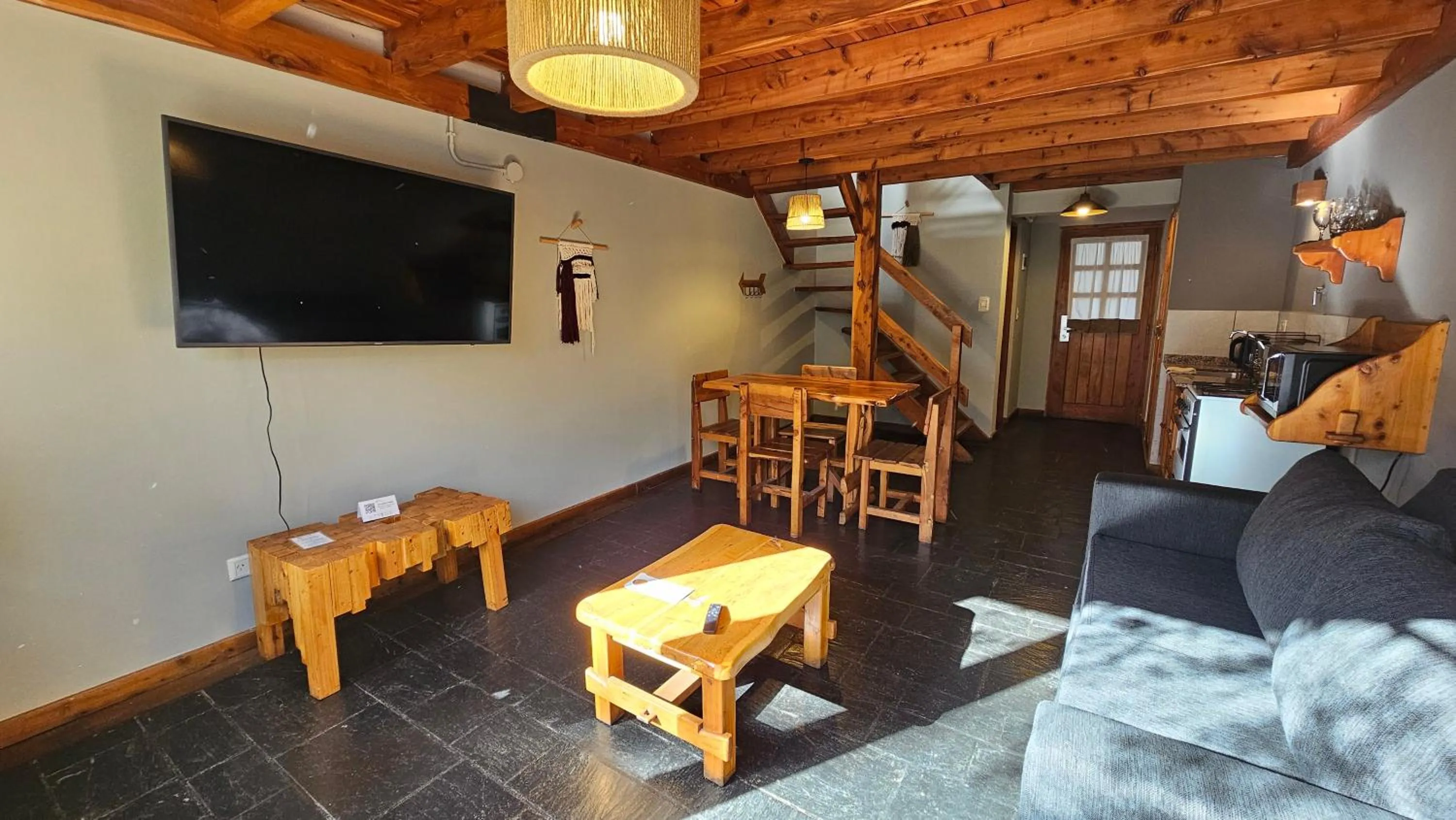 Living room in Pioneros Suites by Grupo Tierra Gaucha