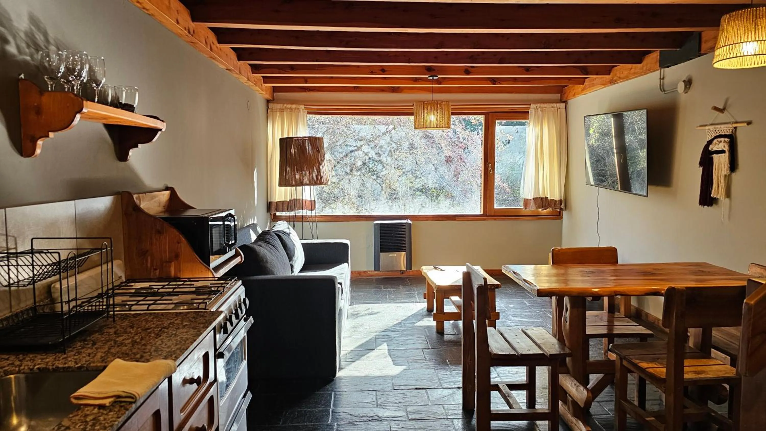 Living room in Pioneros Suites by Grupo Tierra Gaucha