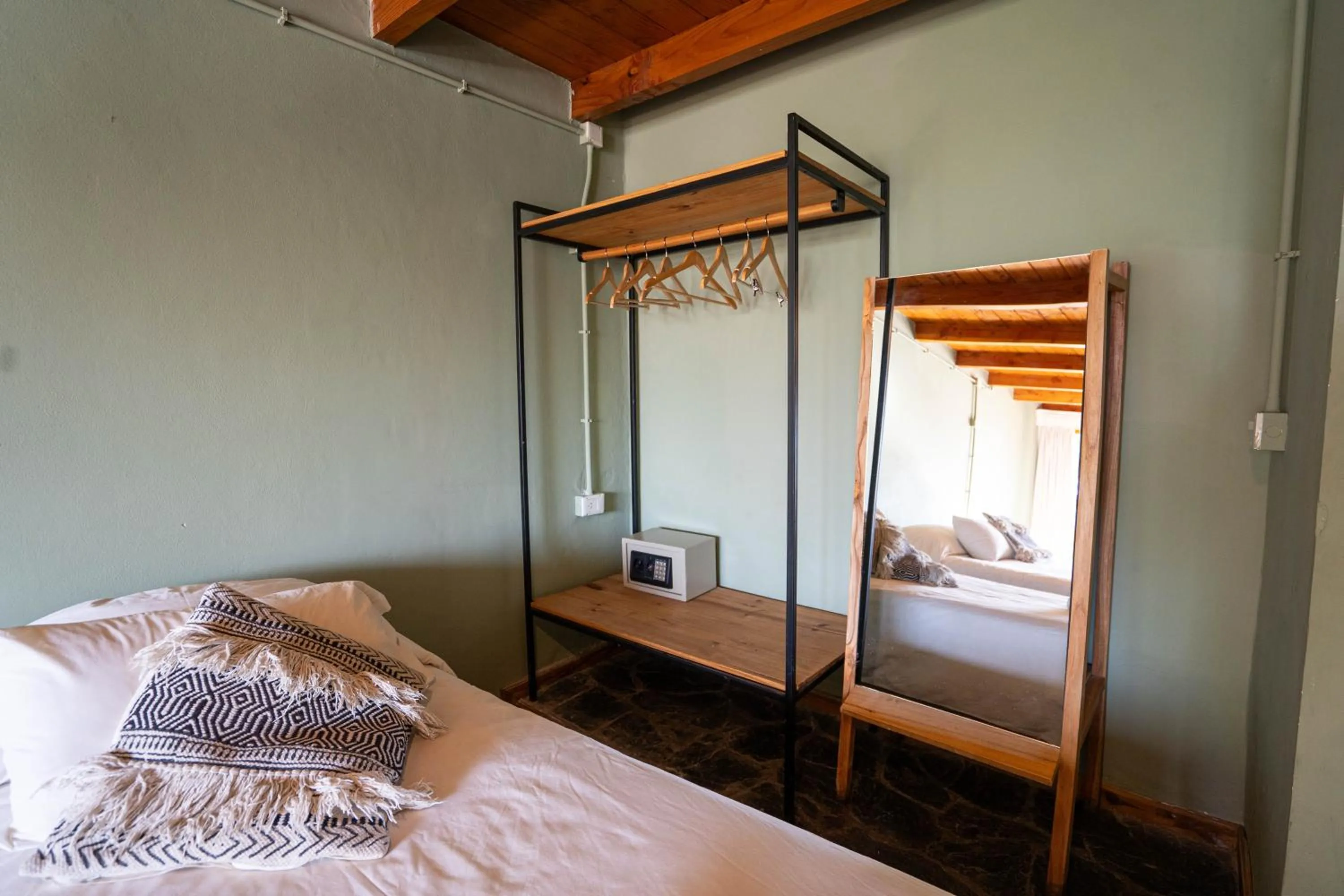 Bed in Pioneros Suites by Grupo Tierra Gaucha