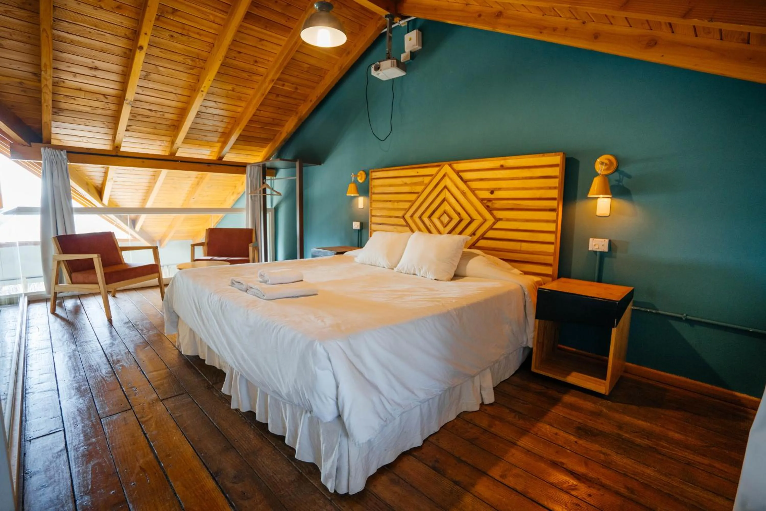 Bedroom, Bed in Pioneros Suites by Grupo Tierra Gaucha