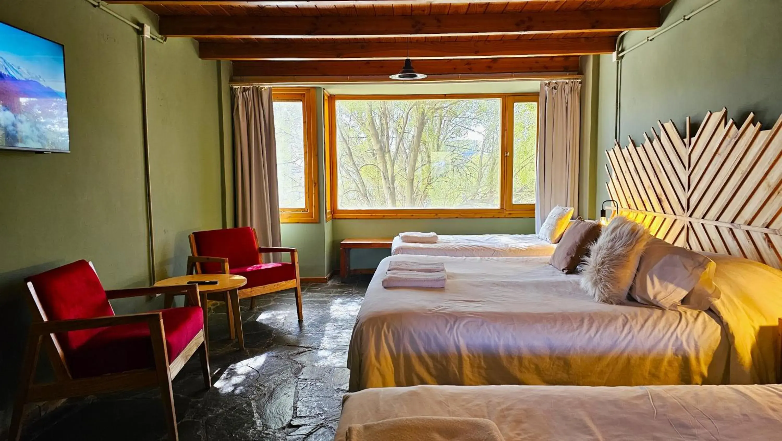 Quadruple Room in Pioneros Suites by Grupo Tierra Gaucha Quadruple Room in Pioneros Suites by Grupo Tierra Gaucha