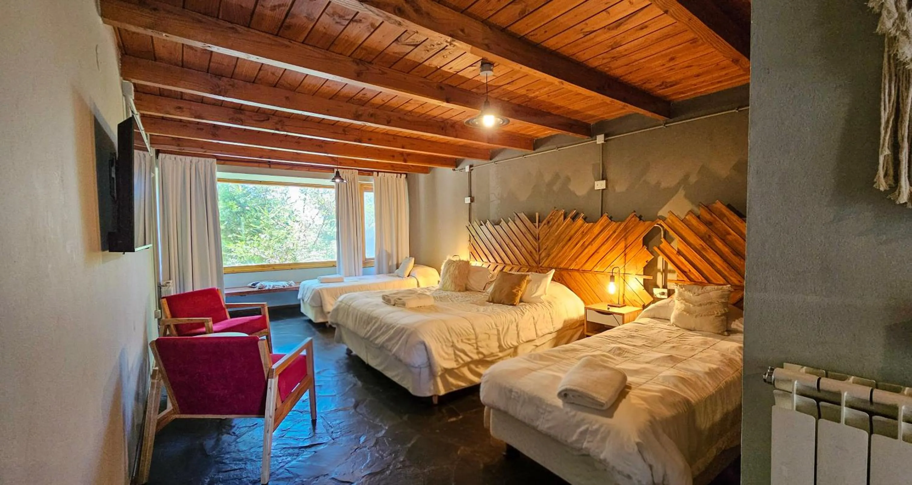 Bedroom, Bed in Pioneros Suites by Grupo Tierra Gaucha