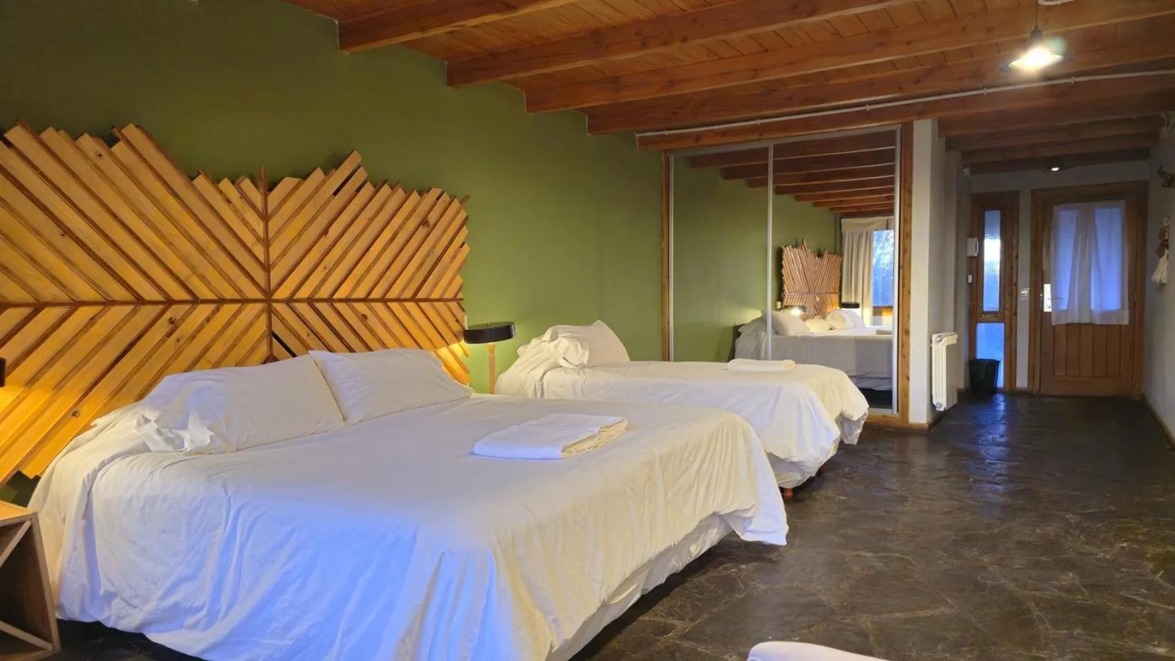 Bedroom, Bed in Pioneros Suites by Grupo Tierra Gaucha