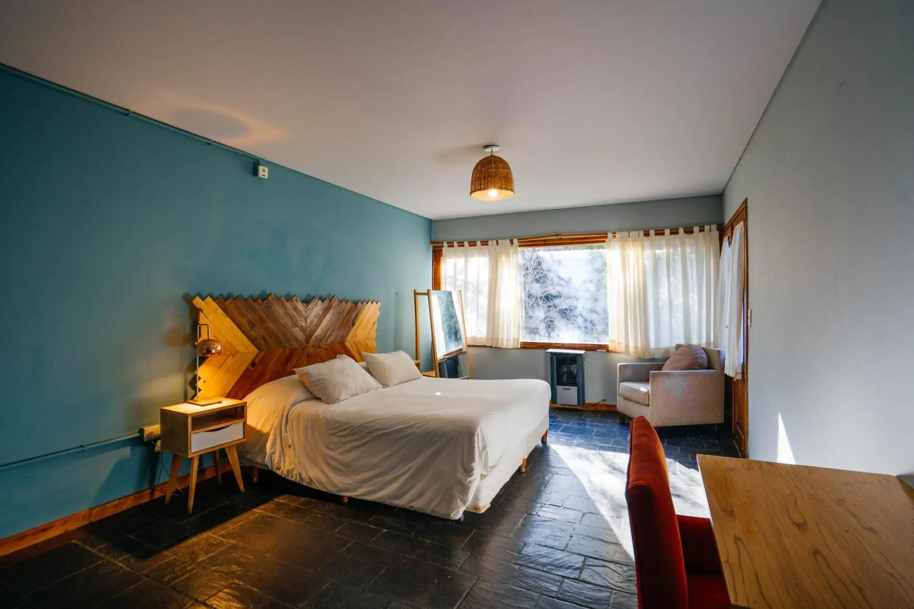 Bedroom, Bed in Pioneros Suites by Grupo Tierra Gaucha Bedroom, Bed in Pioneros Suites by Grupo Tierra Gaucha