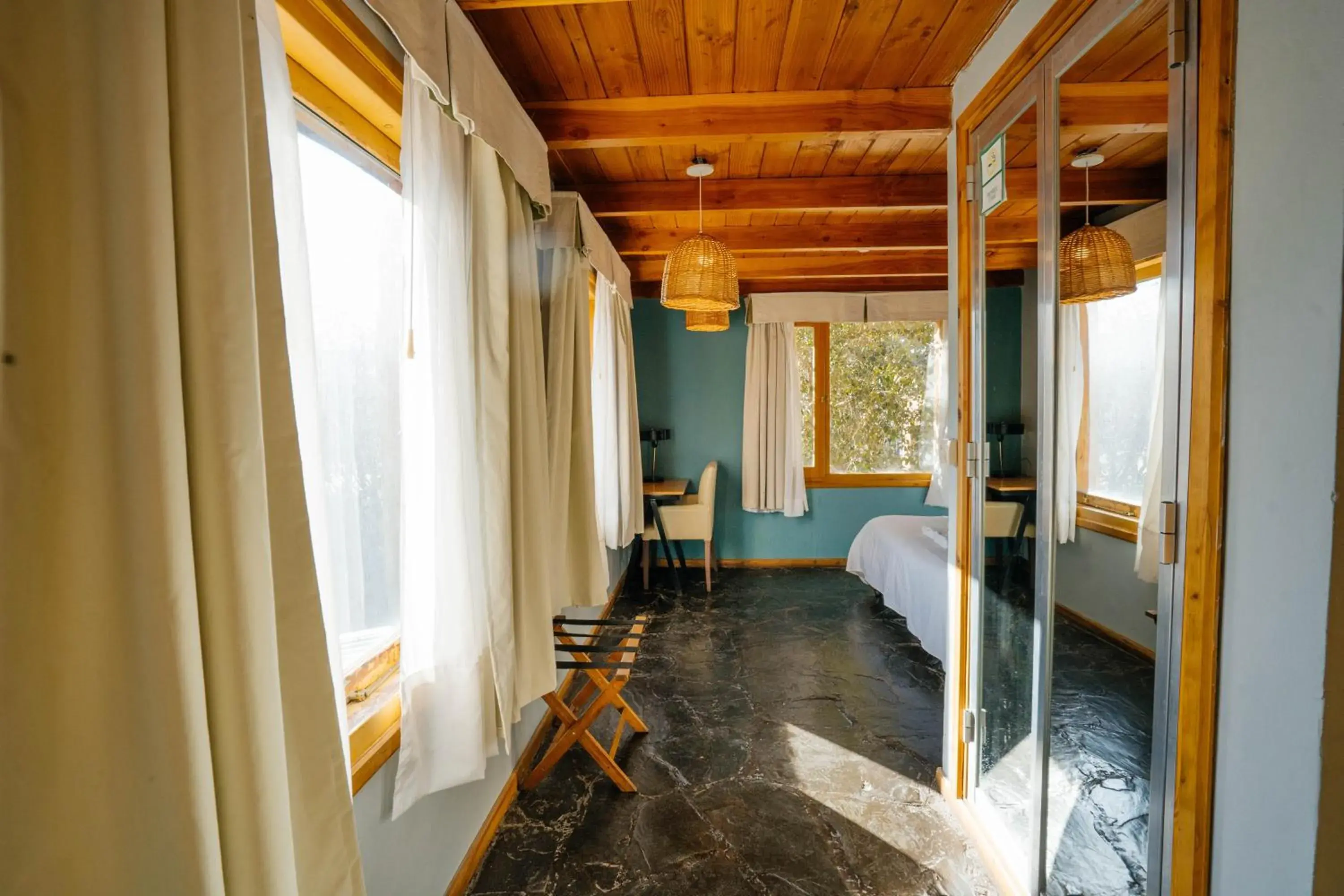 Photo of the whole room in Pioneros Suites by Grupo Tierra Gaucha Photo of the whole room in Pioneros Suites by Grupo Tierra Gaucha