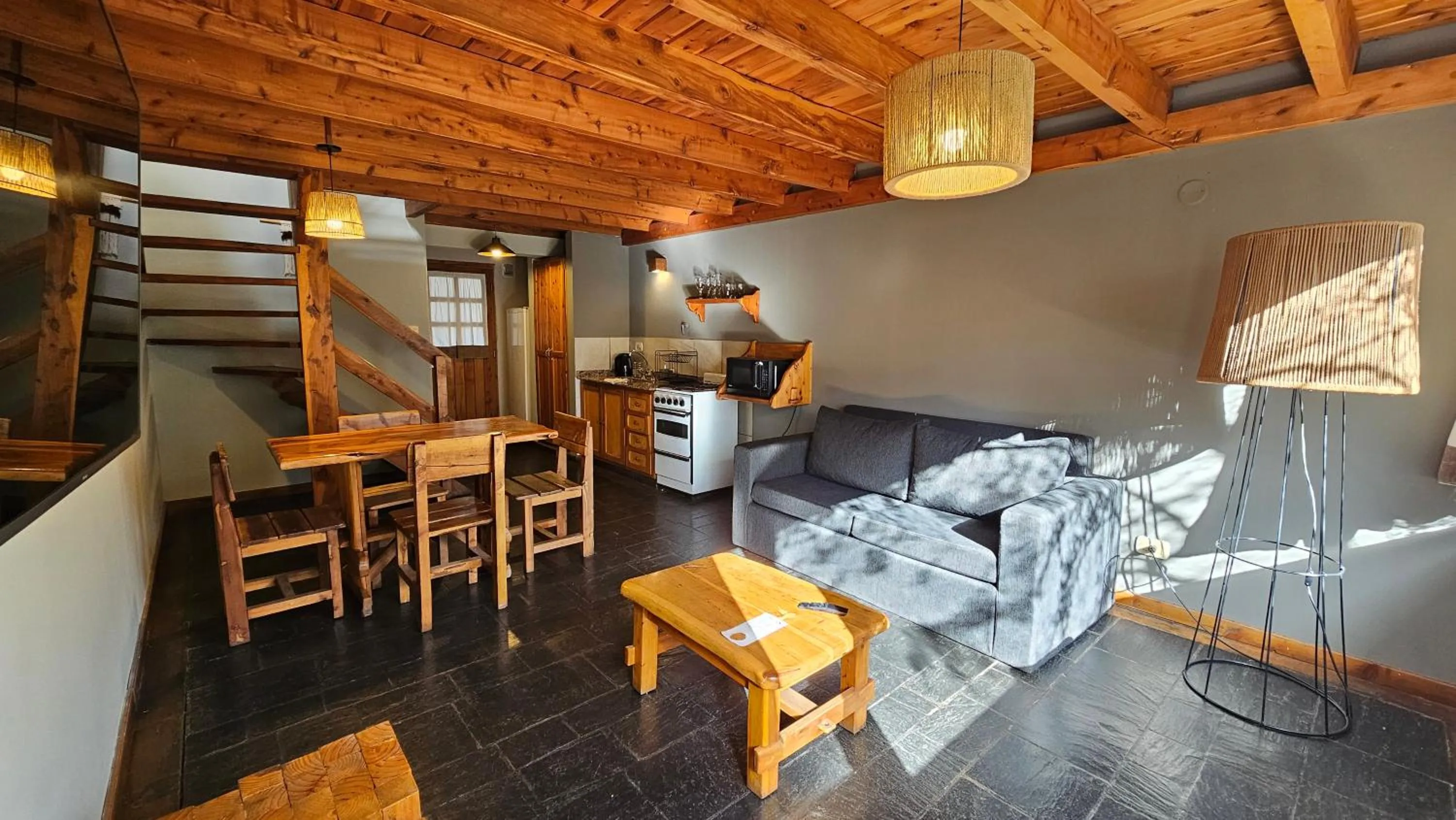 Living room in Pioneros Suites by Grupo Tierra Gaucha