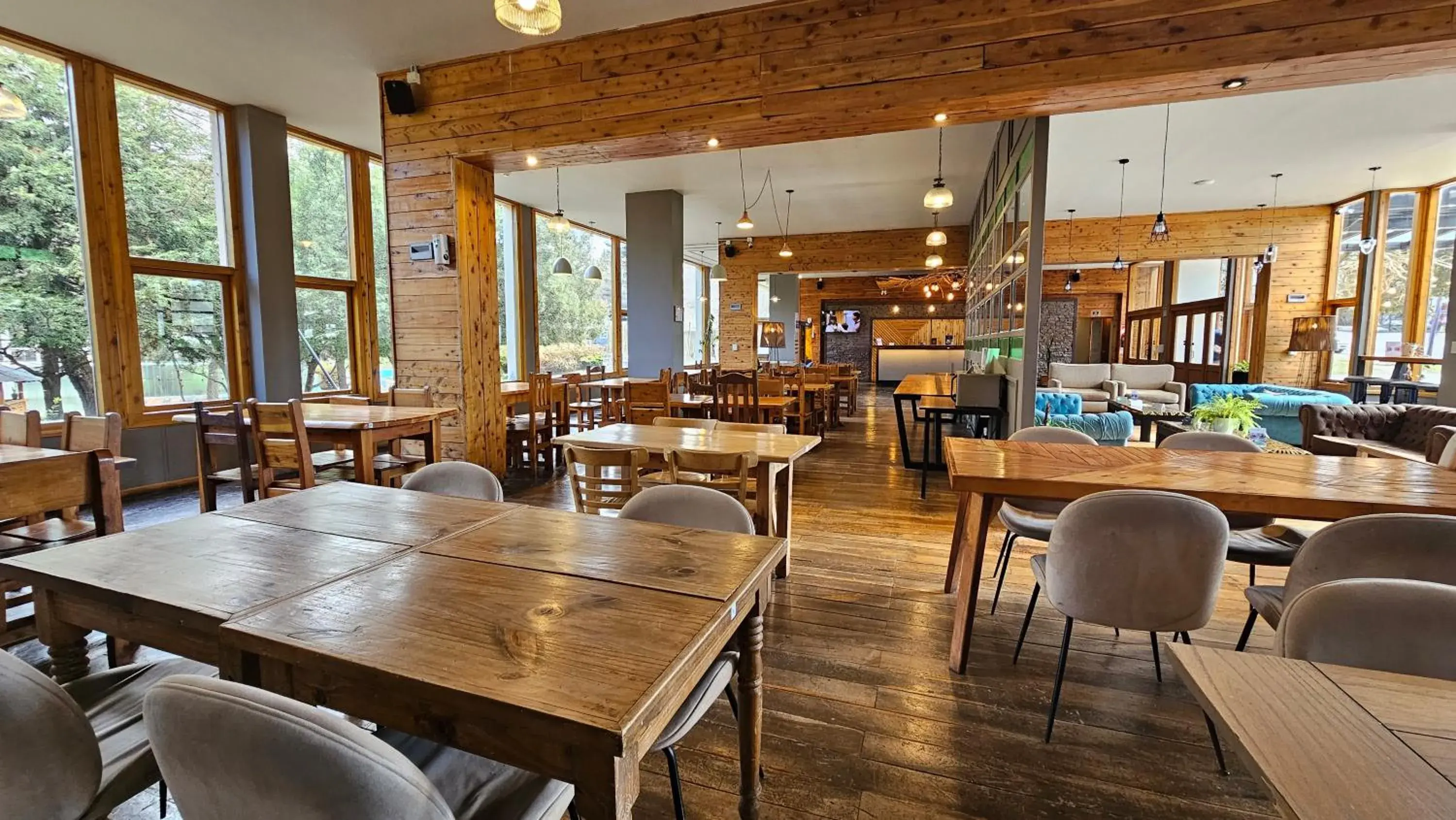 Lobby or reception in Pioneros Suites by Grupo Tierra Gaucha Lobby or reception in Pioneros Suites by Grupo Tierra Gaucha