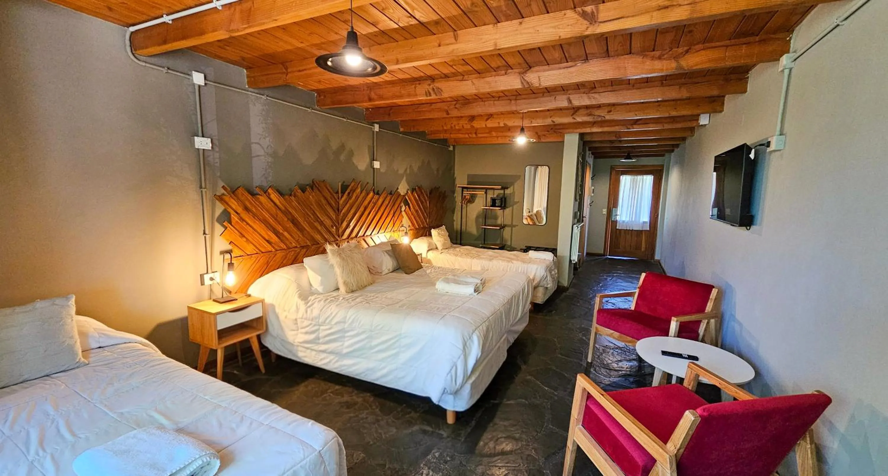 TV and multimedia, Bed in Pioneros Suites by Grupo Tierra Gaucha