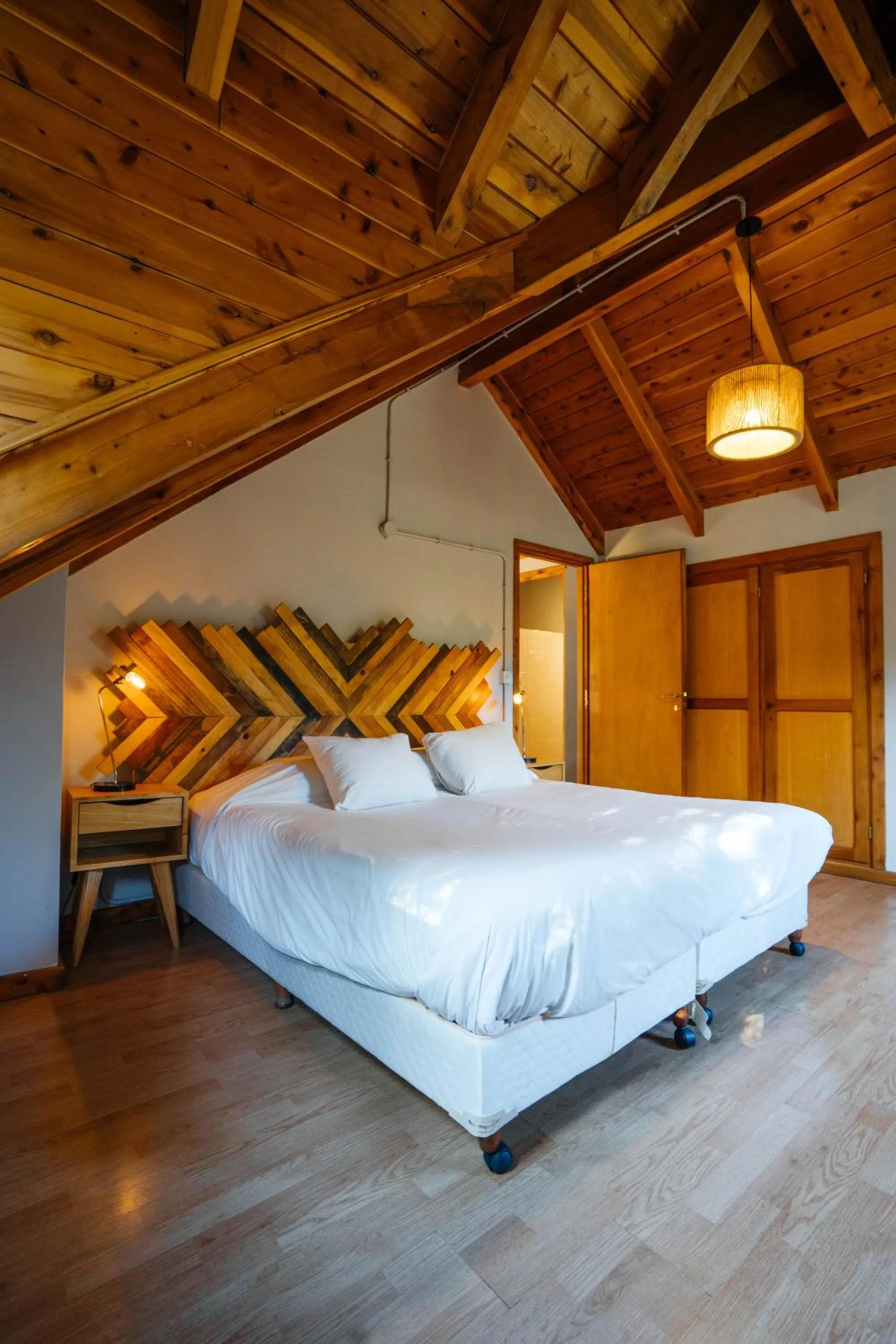 Bedroom, Bed in Pioneros Suites by Grupo Tierra Gaucha