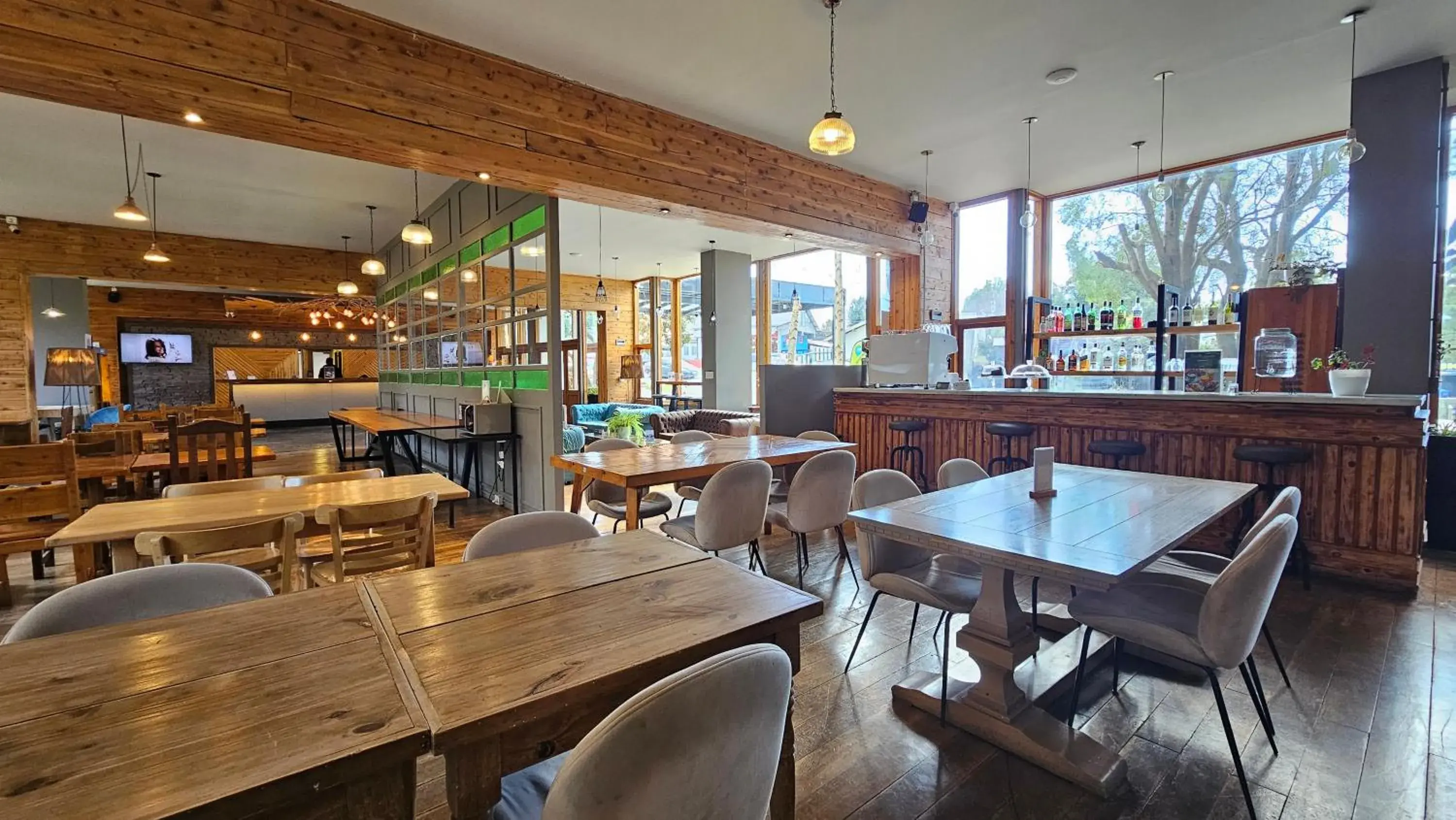 Lobby or reception in Pioneros Suites by Grupo Tierra Gaucha Lobby or reception in Pioneros Suites by Grupo Tierra Gaucha