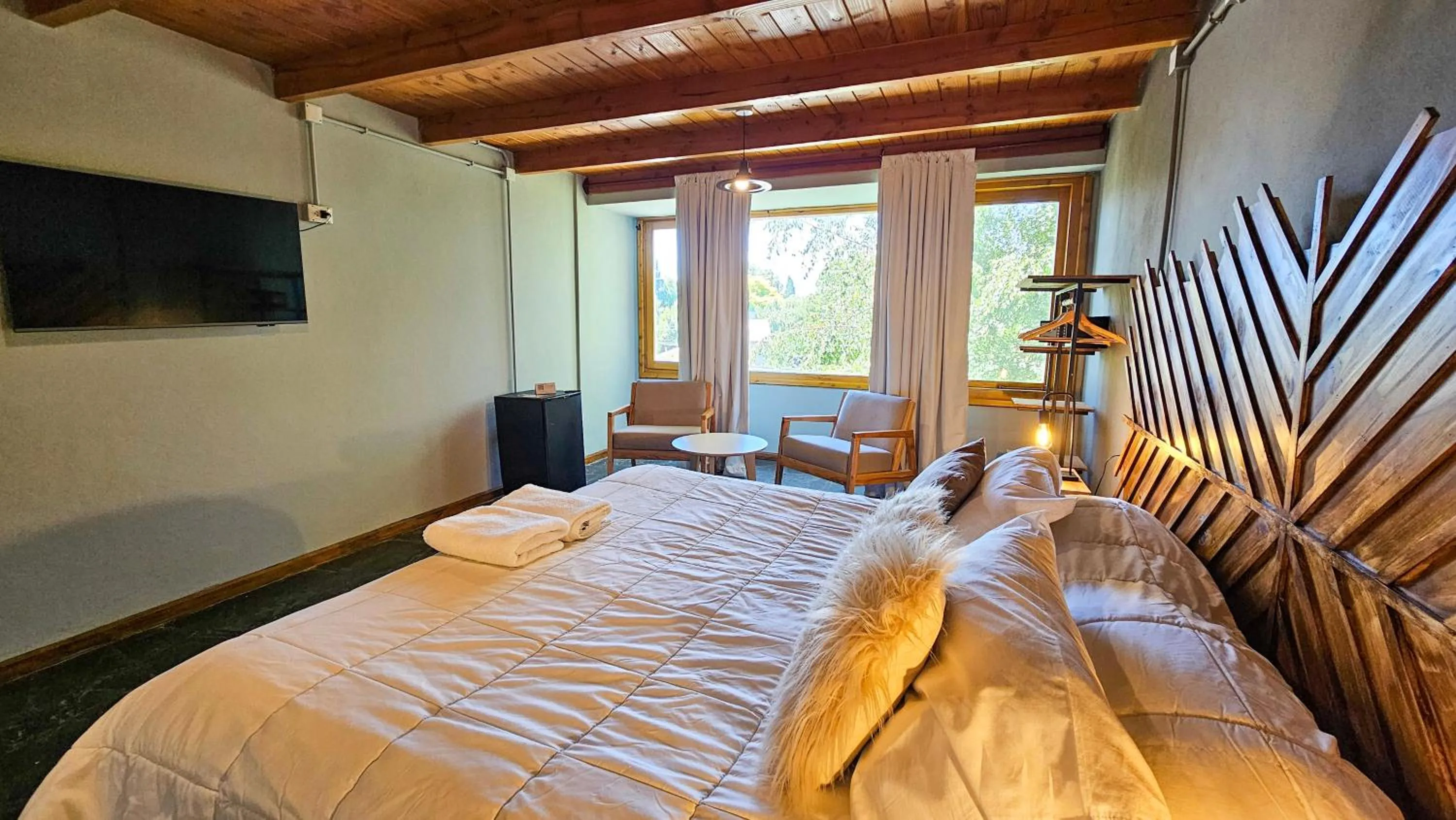 Bedroom, Bed in Pioneros Suites by Grupo Tierra Gaucha