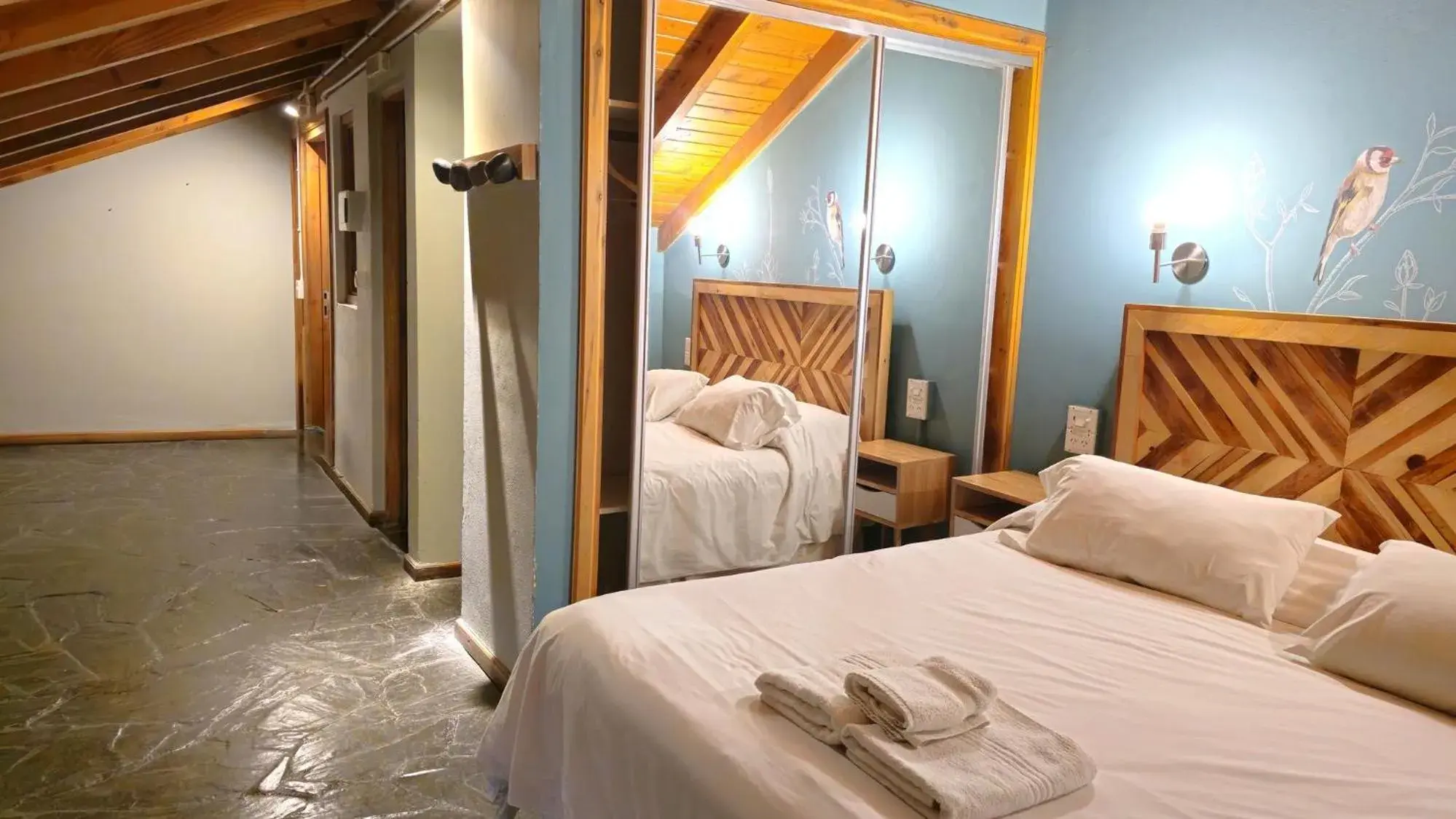 Bedroom, Bed in Pioneros Suites by Grupo Tierra Gaucha Bedroom, Bed in Pioneros Suites by Grupo Tierra Gaucha