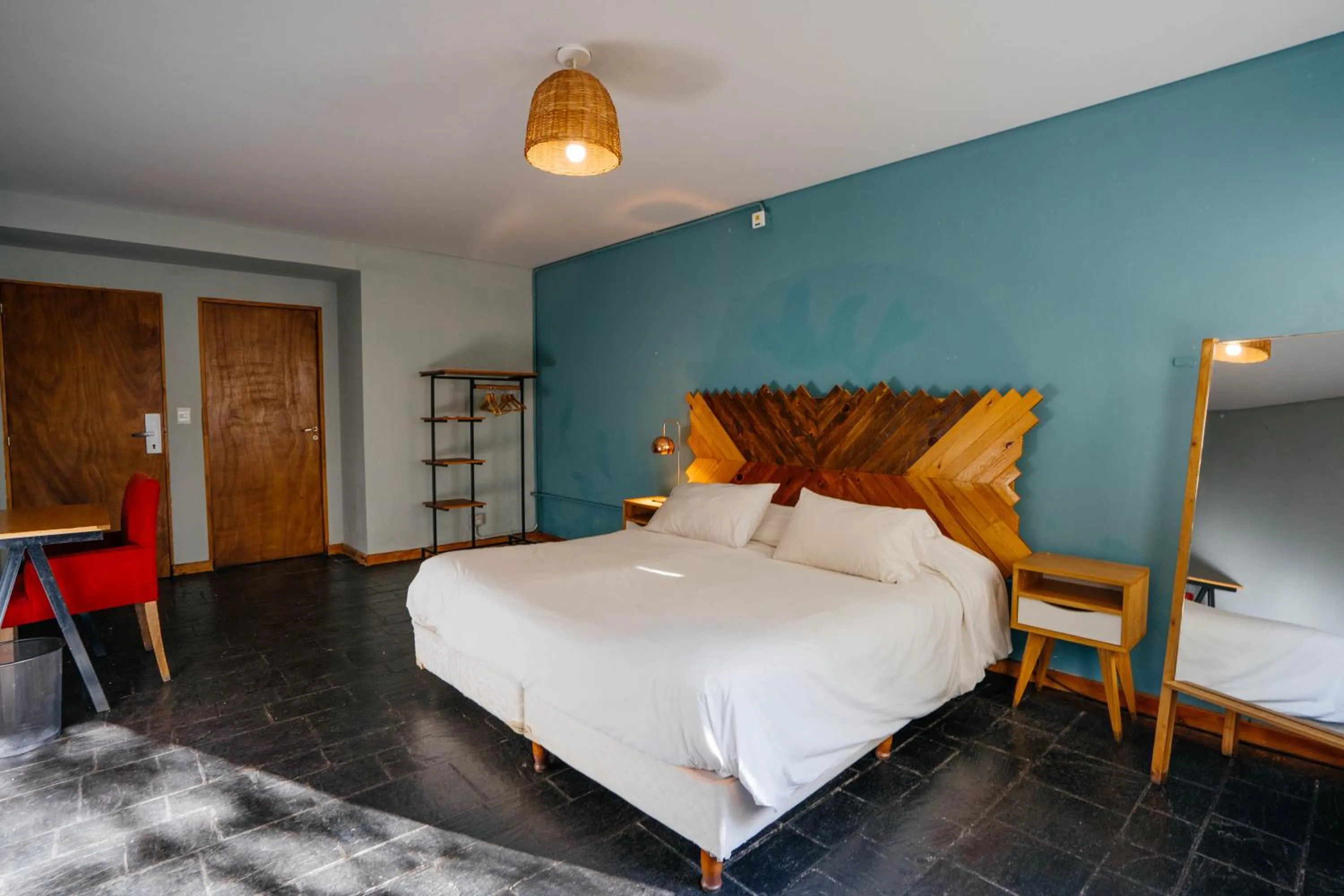 Bedroom, Bed in Pioneros Suites by Grupo Tierra Gaucha