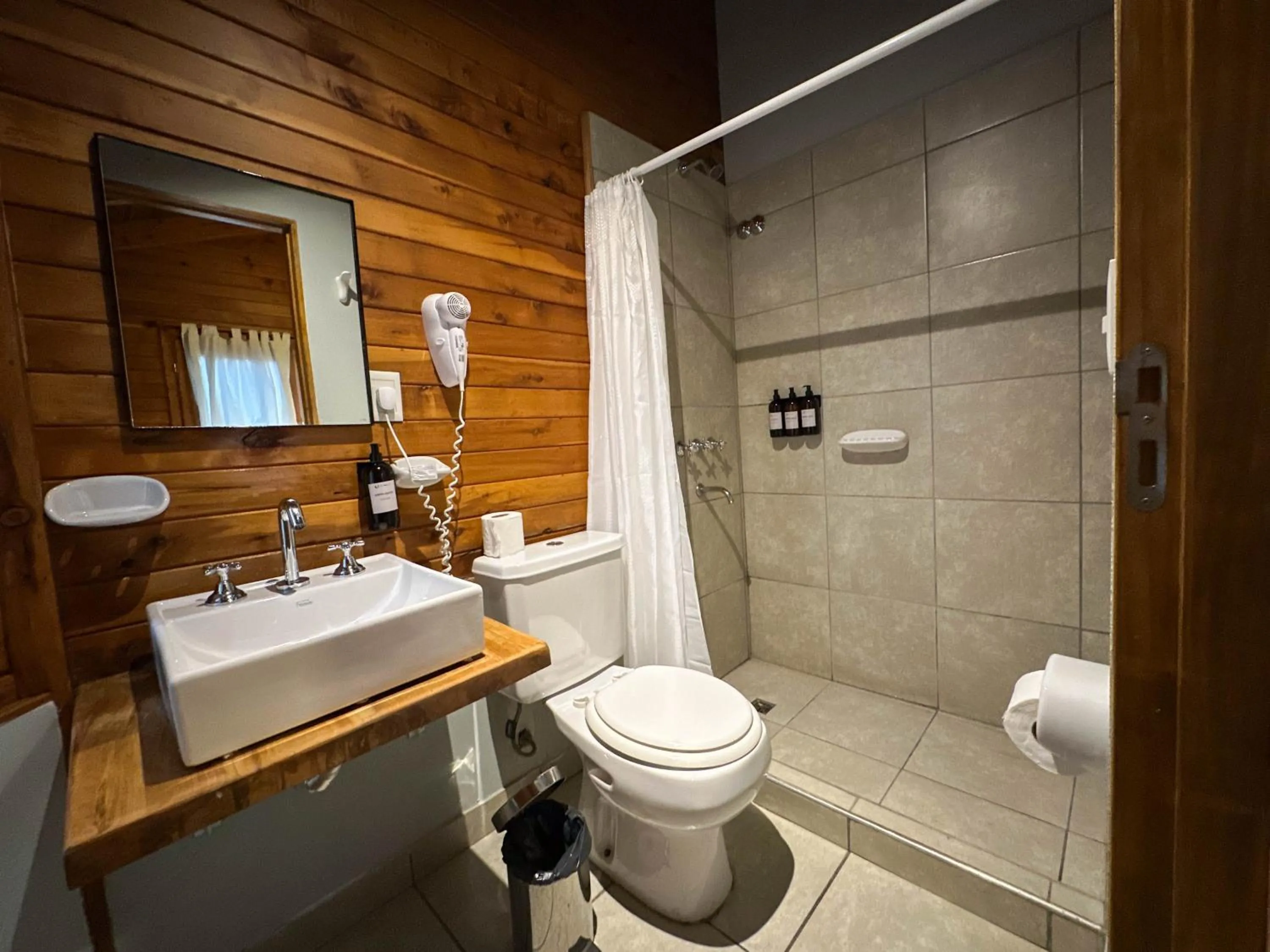 Bathroom in Pioneros Suites by Grupo Tierra Gaucha