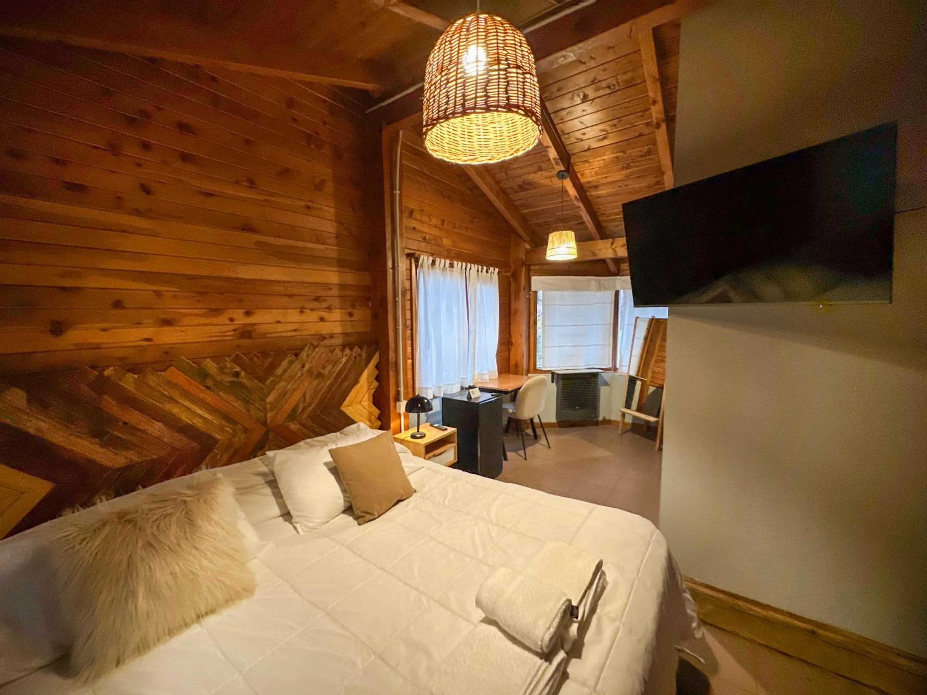 Photo of the whole room, Bed in Pioneros Suites by Grupo Tierra Gaucha