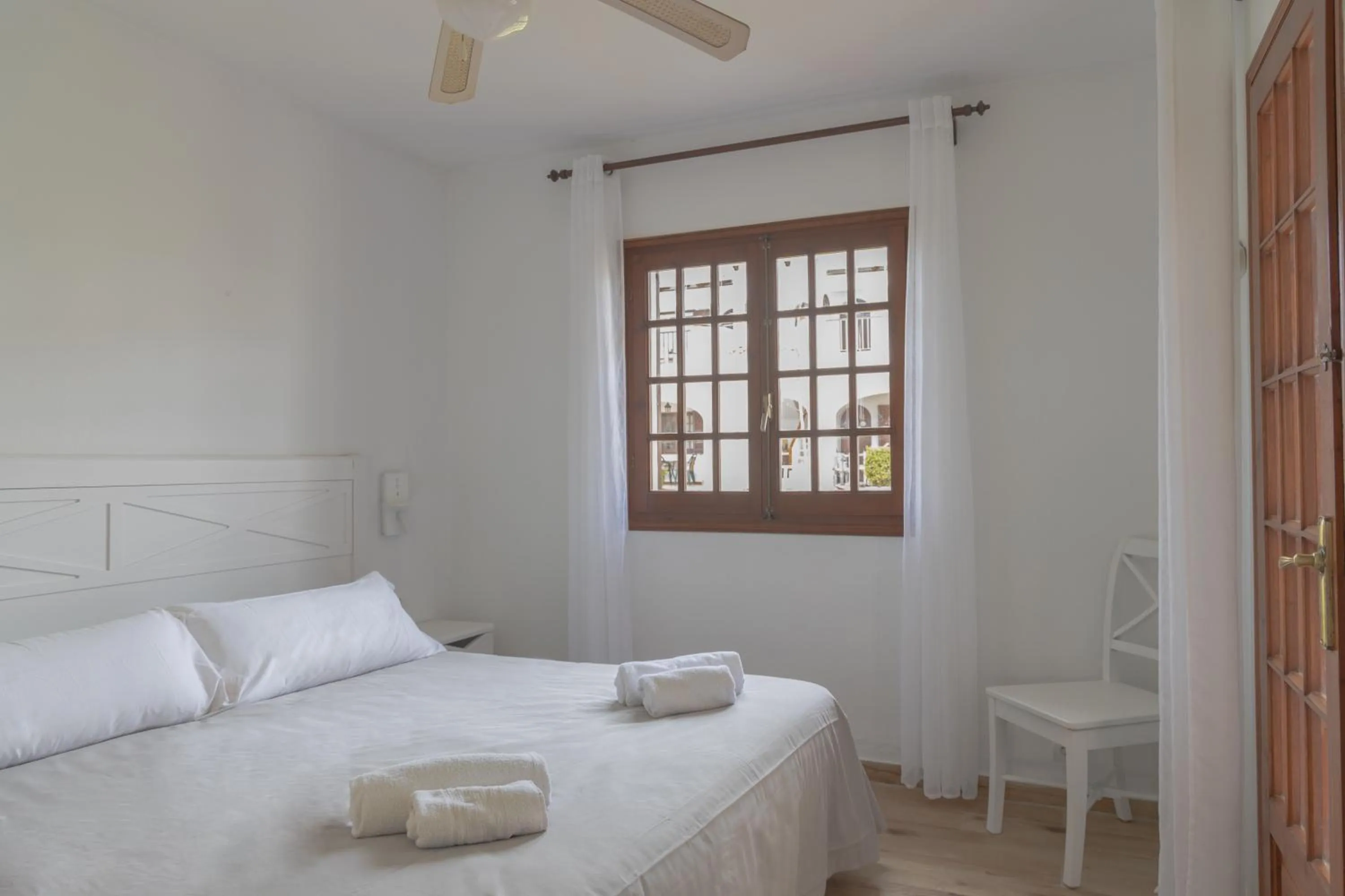 Bed in Apartamentos Son Bou Gardens By MENORCARENTALS