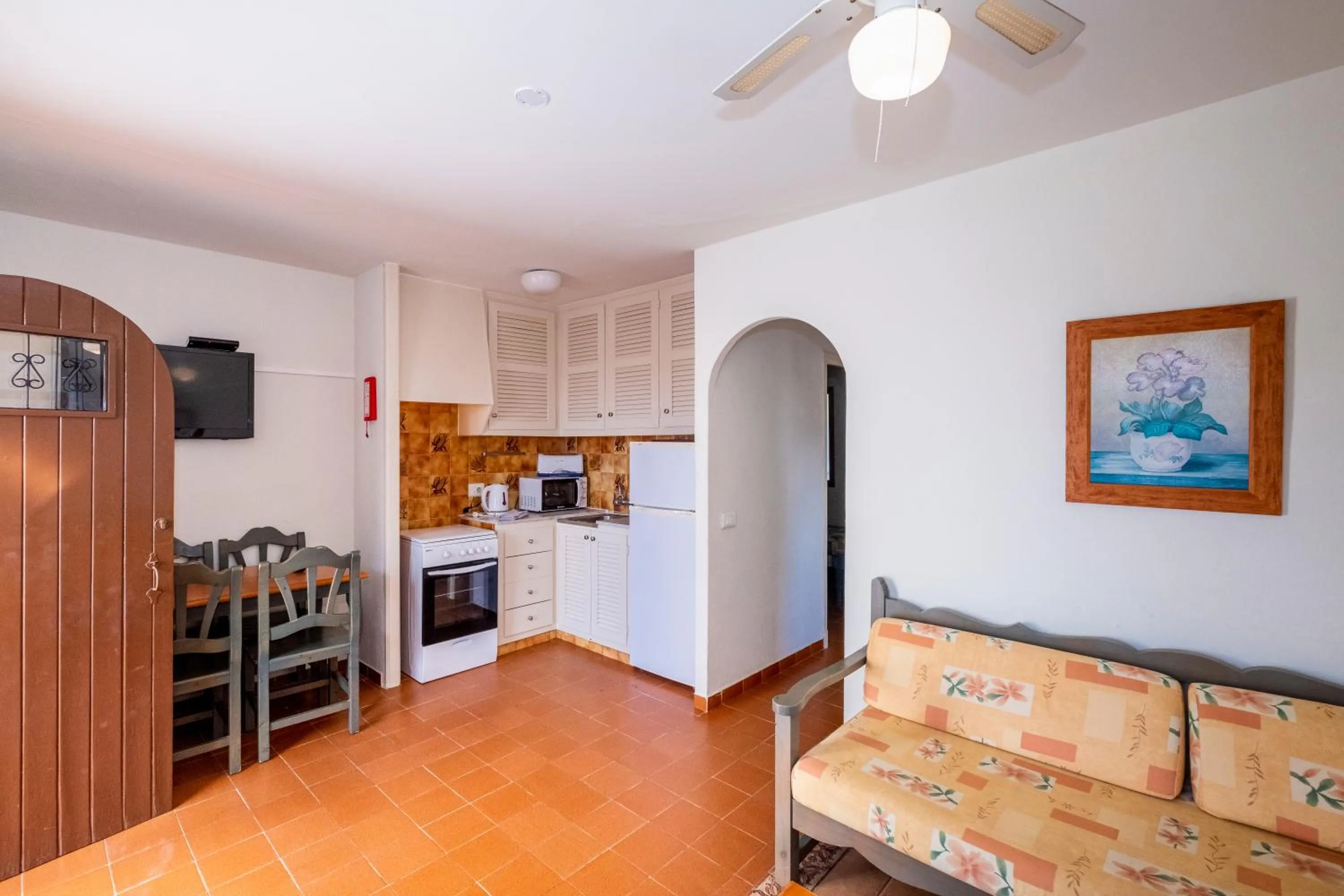 Kitchen or kitchenette in Apartamentos Son Bou Gardens By MENORCARENTALS