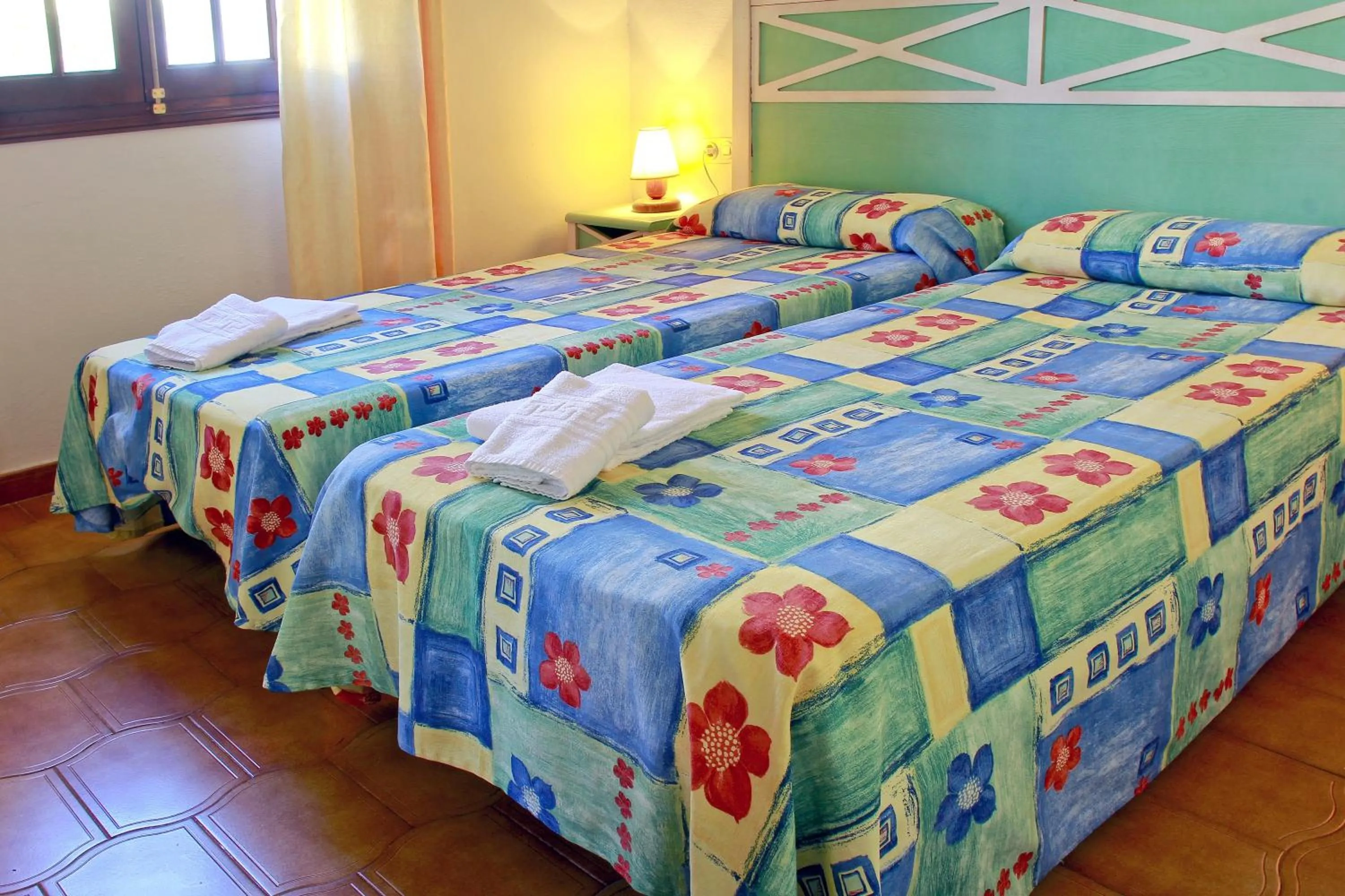 Bedroom, Bed in Apartamentos Son Bou Gardens By MENORCARENTALS