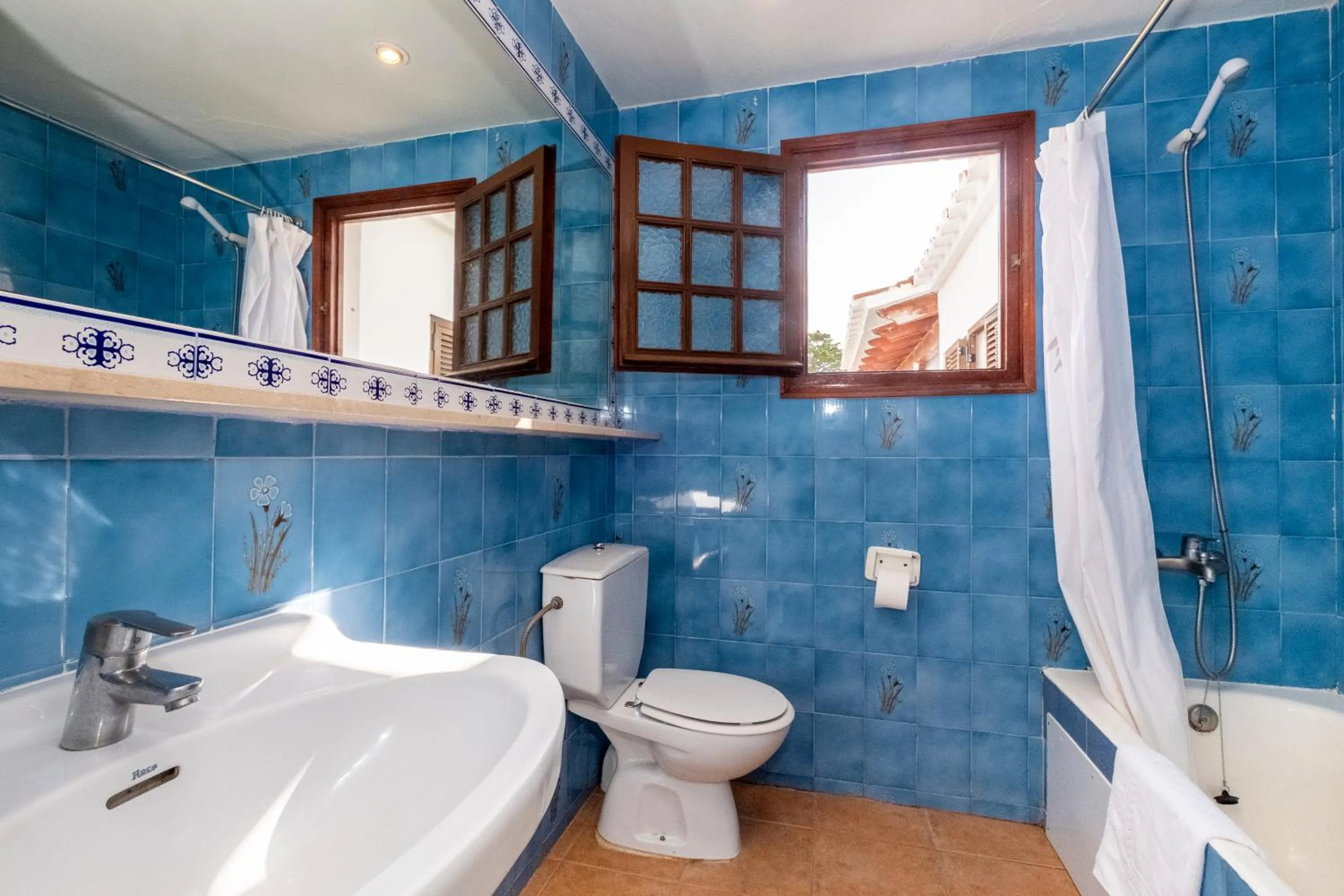 Bathroom in Apartamentos Son Bou Gardens By MENORCARENTALS