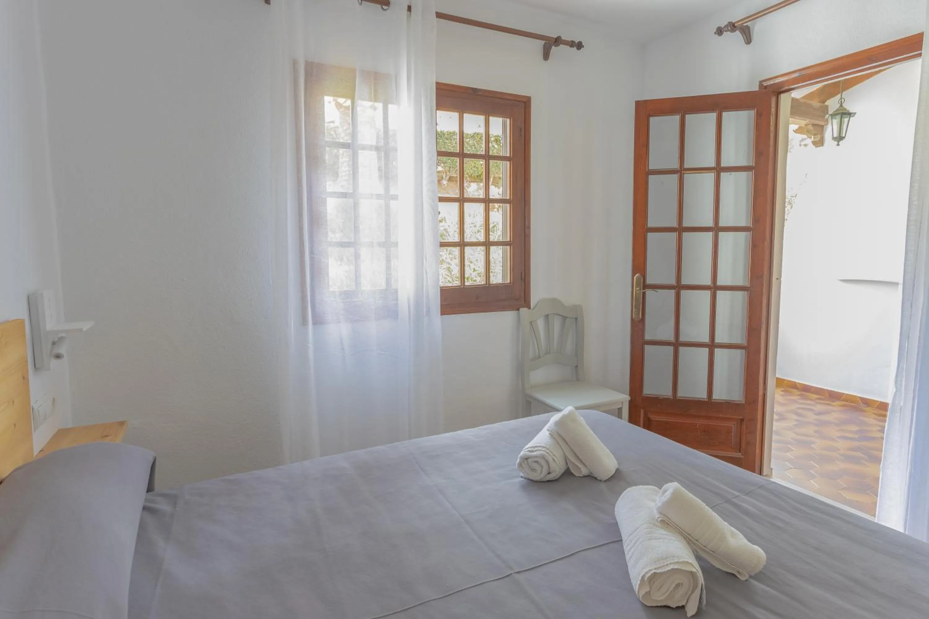Bedroom, Bed in Apartamentos Son Bou Gardens By MENORCARENTALS