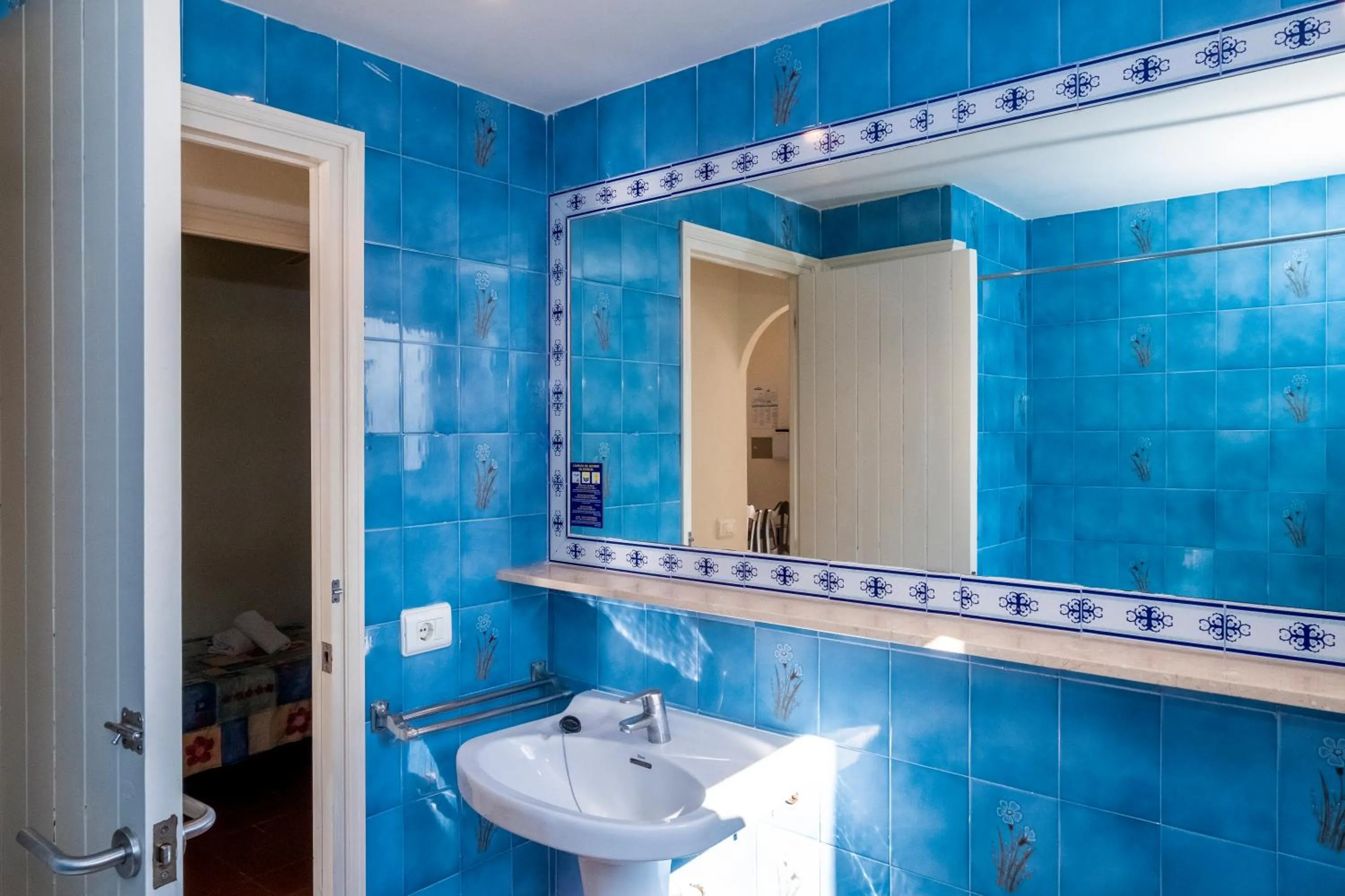 Bathroom in Apartamentos Son Bou Gardens By MENORCARENTALS