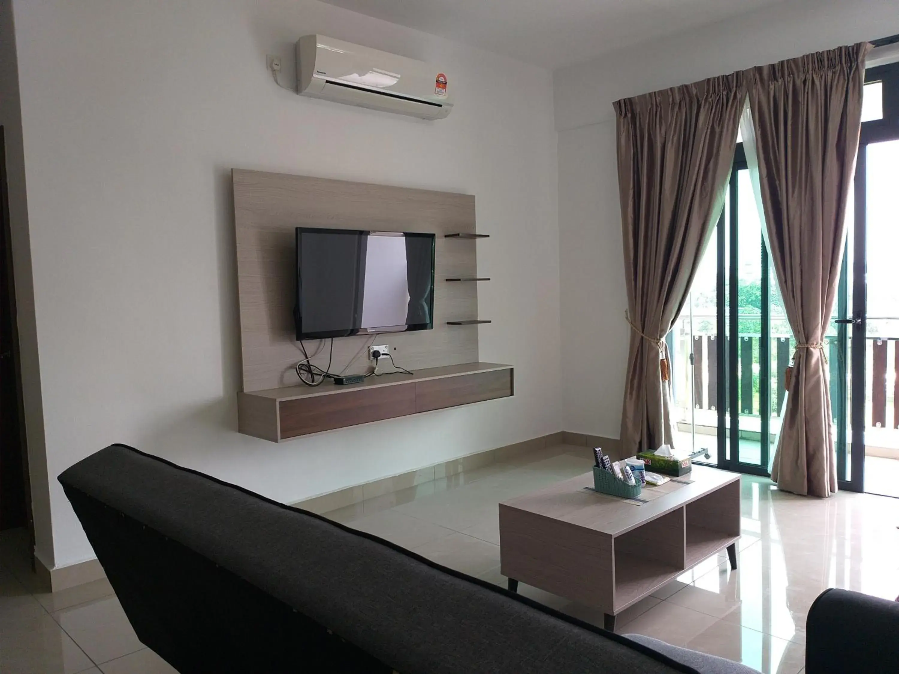 Living room in Kempas Indah @ The Secret Garden Homestay Living room in Kempas Indah @ The Secret Garden Homestay