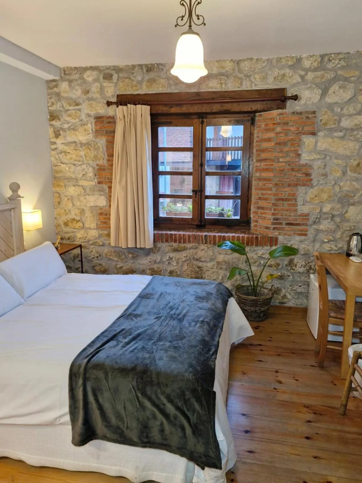 Photo of the whole room, Bed in Hospederia Santillana