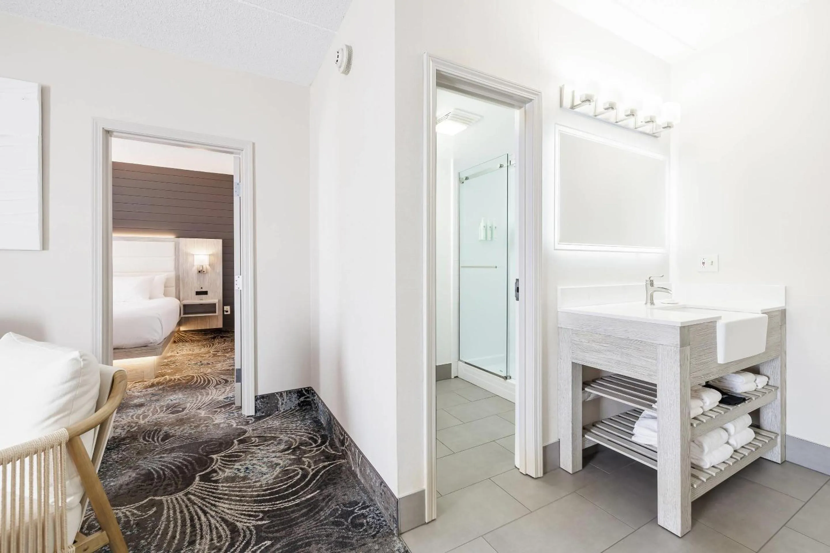 Bedroom in Oakfield Hotel & Suites, an Ascend Collection Hotel