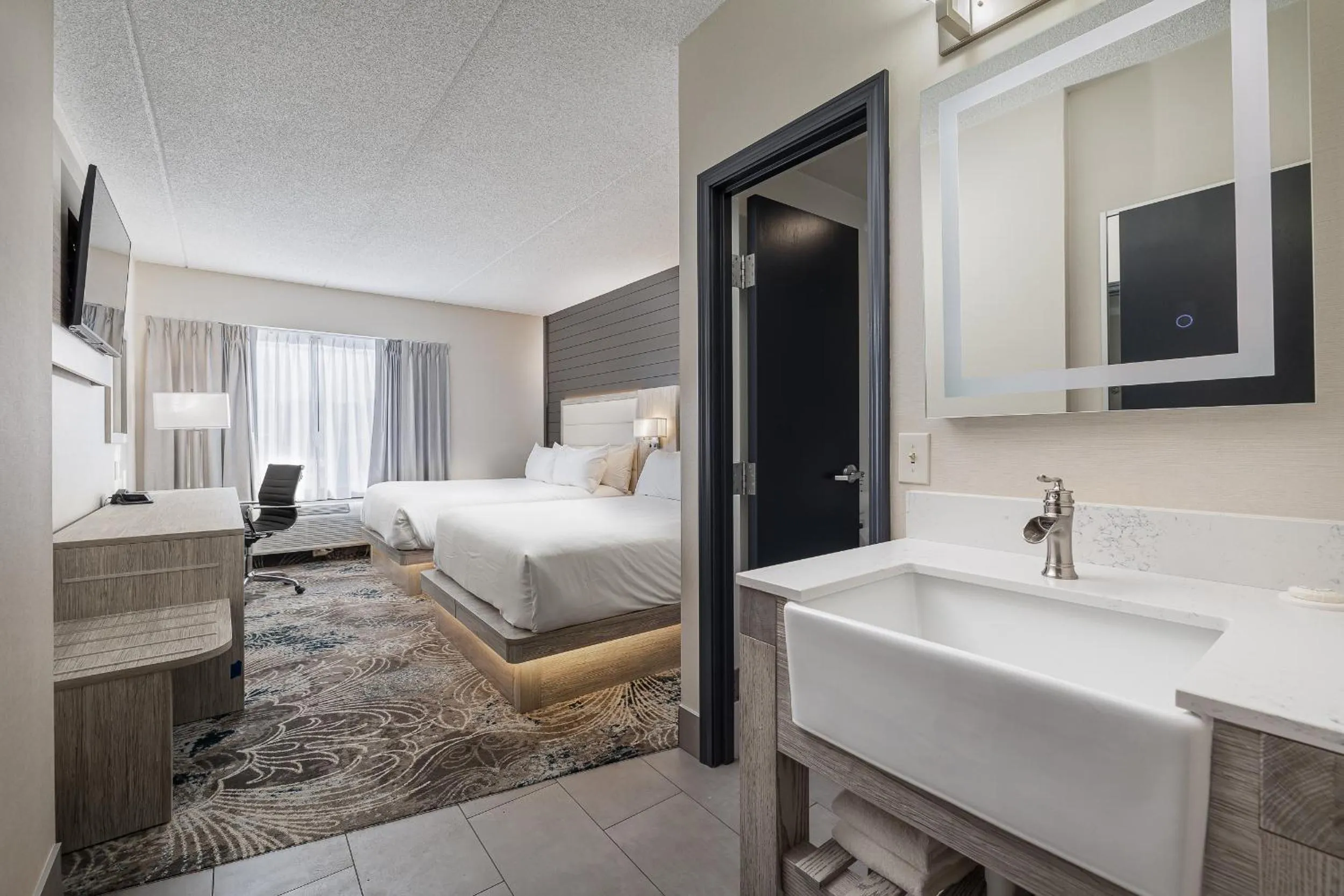 Bedroom, Bed in Oakfield Hotel & Suites, an Ascend Collection Hotel