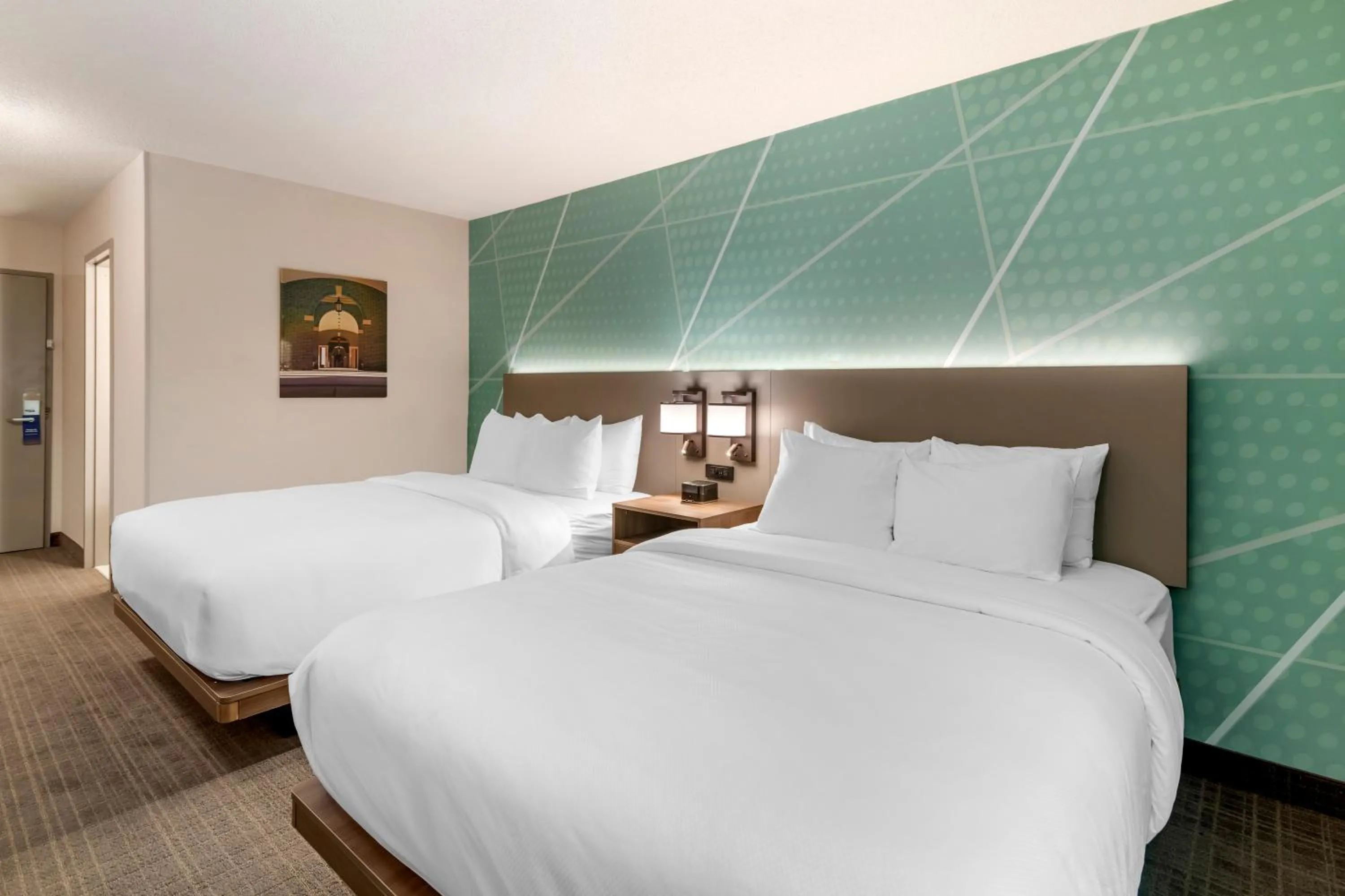 Bed in Comfort Inn & Suites Saratoga Springs