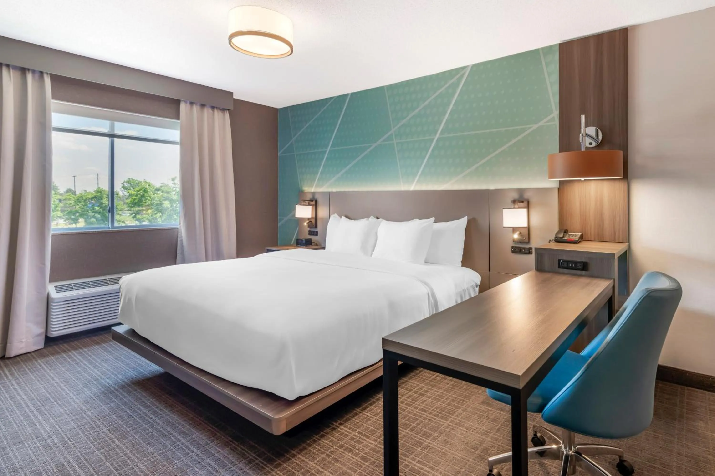 Bed in Comfort Inn & Suites Saratoga Springs